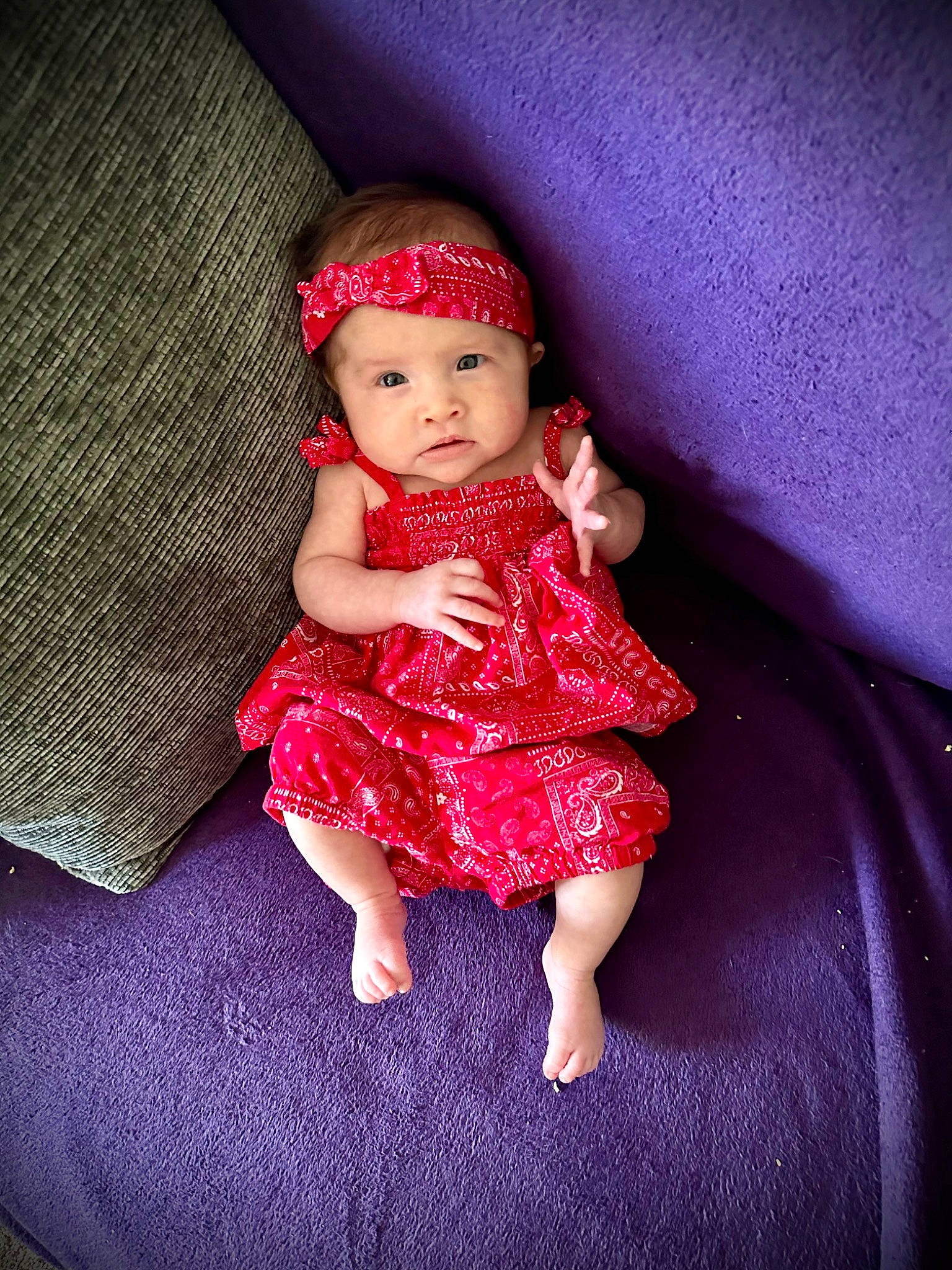 Luna joined the competition — help win amazing prizes! baby, baby_toddler_clothing, cap, child, day_dress, dress, fashion_accessory, flash_photography, hat, headwear, human_leg, iris, lip, magenta, pattern, person, pink, purple, sitting, skin