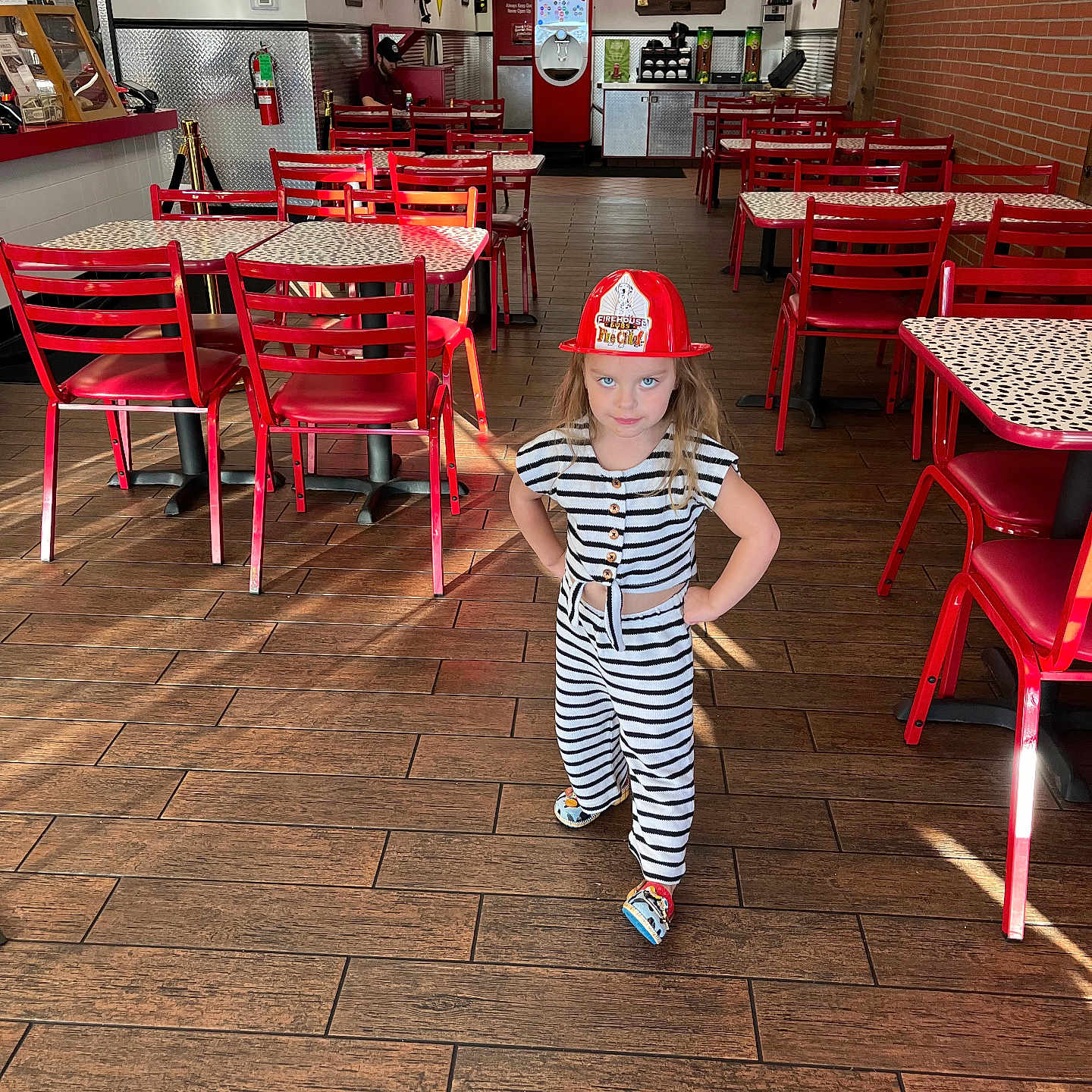 Brynlei joined the competition — help win amazing prizes! cafeteria, cap, child, clothing, diningtable, face, female, furniture, girl, hardwood, hat, head, indoors, interiordesign, person, photography, portrait, restaurant, table, wood