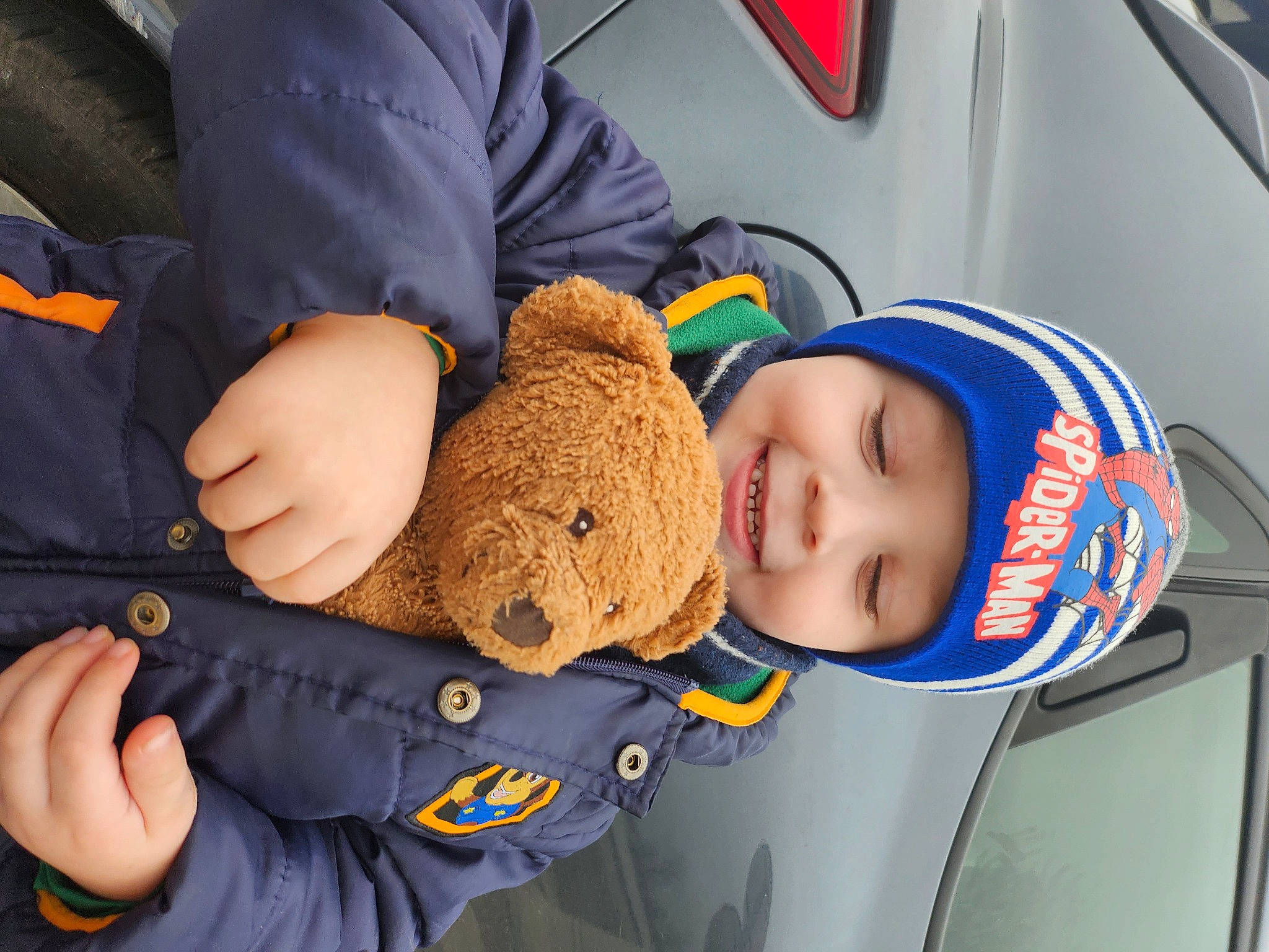 Hayden participe au concours pour gagner de l'argent avec cette photo : auto_part, baby, baby_in_car_seat, baby_products, baby_safety, baby_sleeping, baby_toddler_clothing, car_seat, child, comfort, electric_blue, finger, gesture, headwear, joy, nail, person, steering_wheel, stuffed_toy, thumb