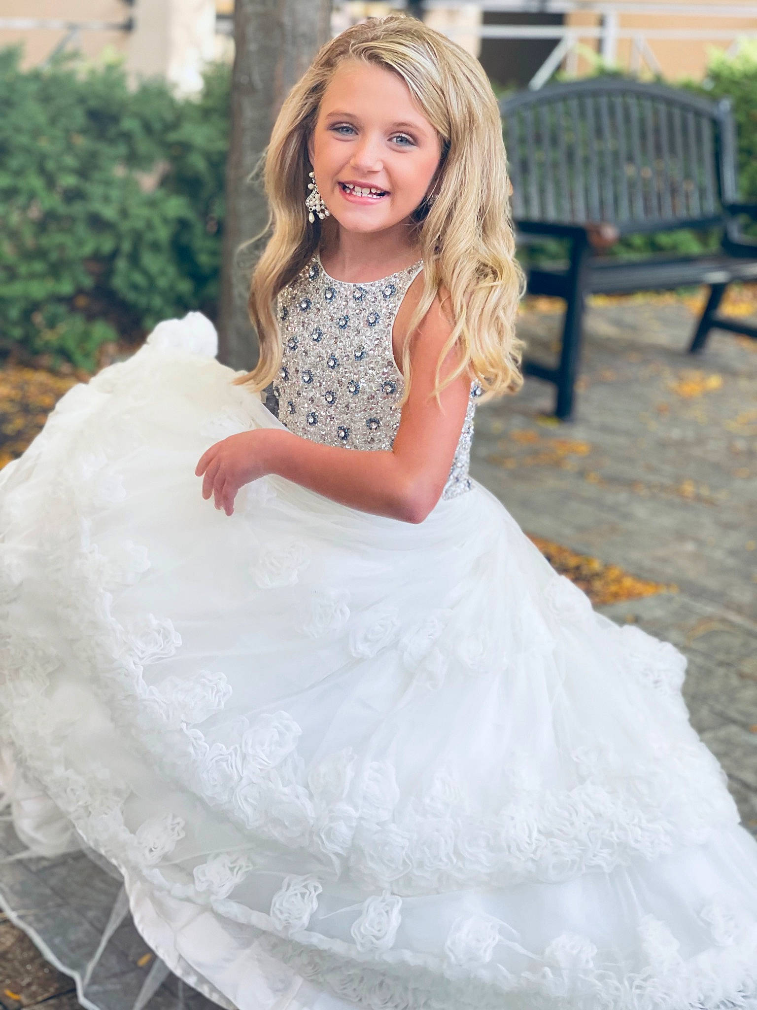 Harlee joined the competition — help win amazing prizes! bridal_clothing, bridal_party_dress, clothing, dress, embellishment, eye, facial_expression, fashion, flash_photography, formal_wear, gown, hairstyle, happy, joy, person, pink, plant, shoulder, smile, standing