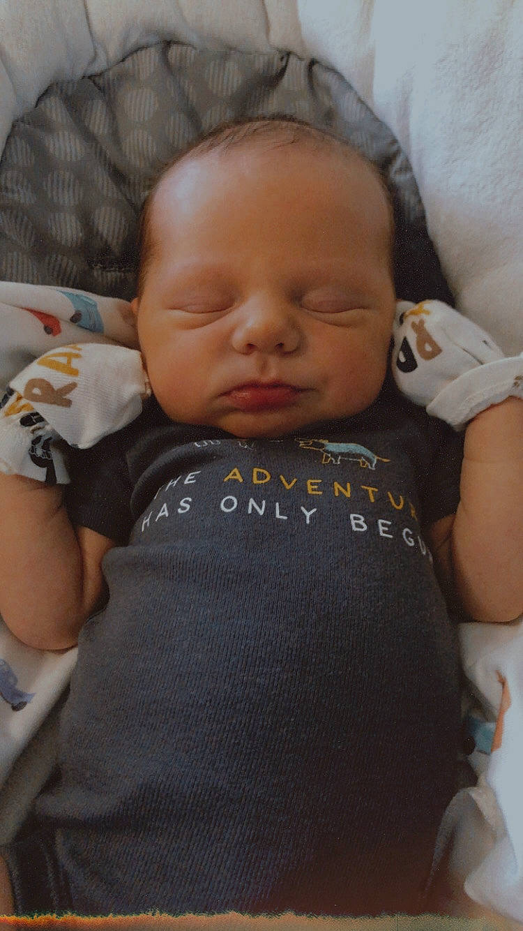 Jasper joined the competition — help win amazing prizes! baby, baby_toddler_clothing, brown, cheek, chin, comfort, ear, eyebrow, facial_expression, finger, forehead, iris, lip, mouth, neck, nose, person, skin, sleeve, textile