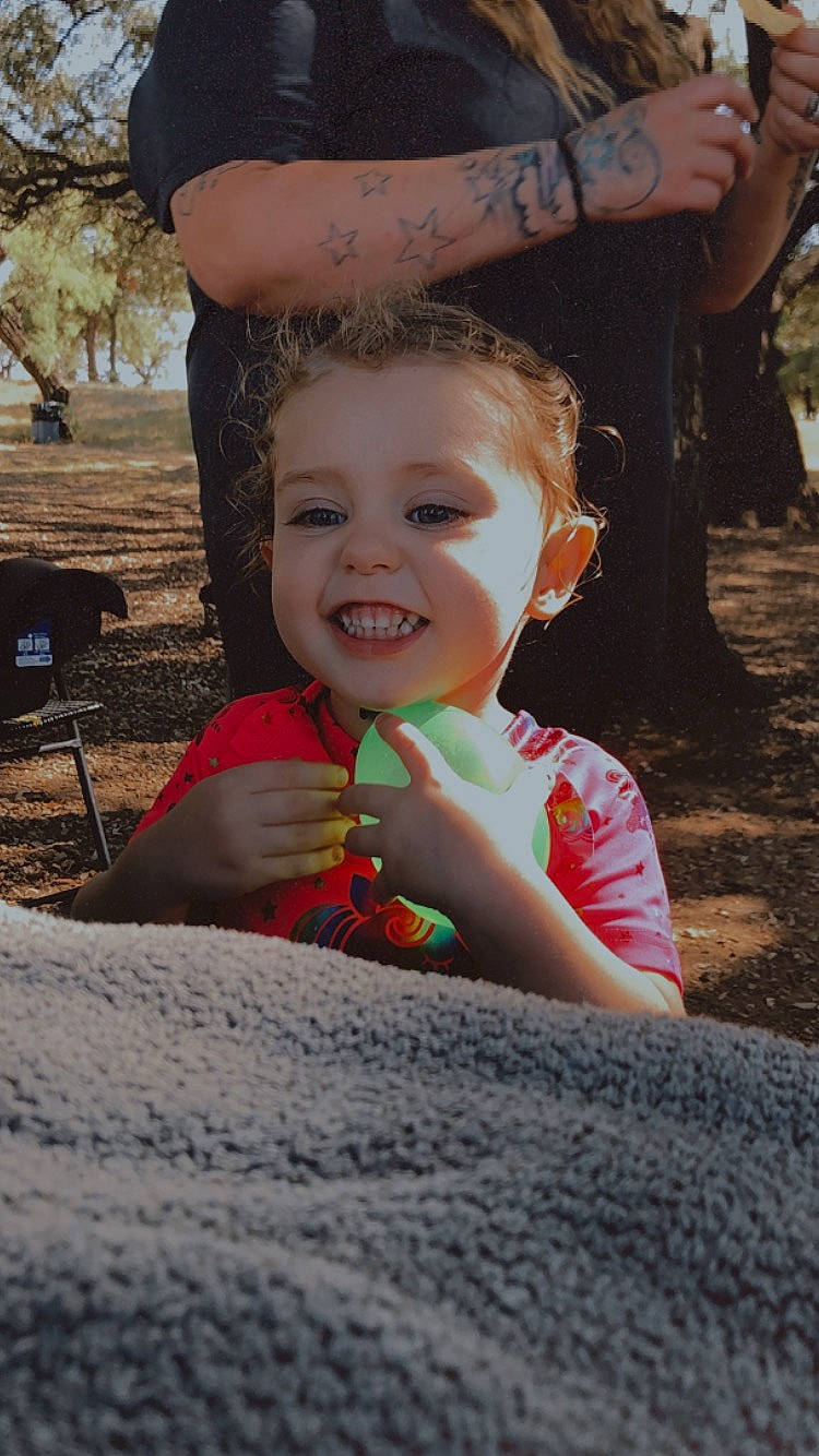 Haisley joined the competition — help win amazing prizes! arm, child, event, fun, grass, happy, joy, leisure, lip, people, people_in_nature, person, plant, play, recreation, sitting, skin, smile, soil, summer