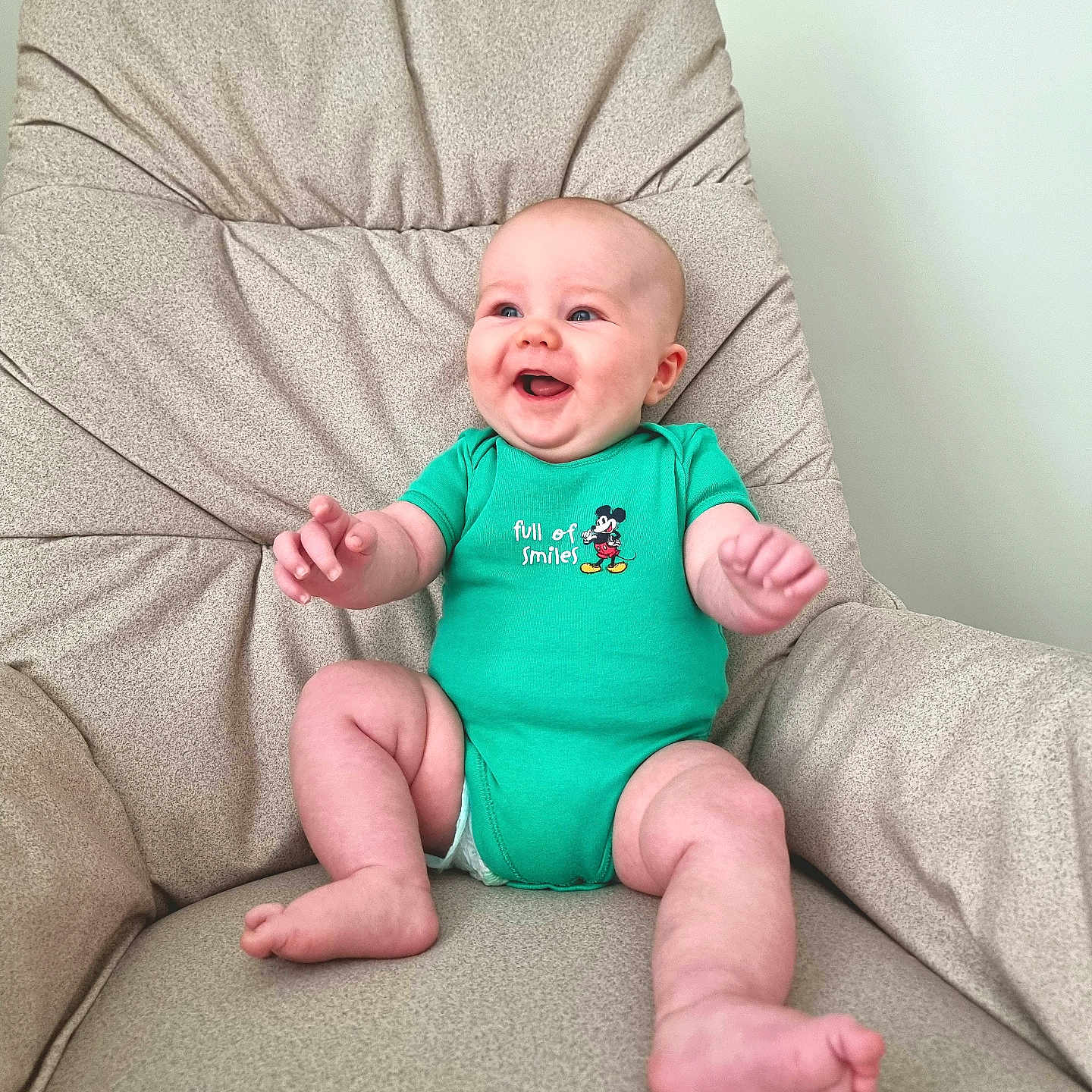Jesse is registered to the contest to win money with this photo: armchair, baby, babylaughing, chair, clothing, cushion, face, furniture, happy, head, homedecor, laughing, newborn, person, photography, portrait, sitting, smile, t_shirt