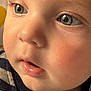 George joined the competition — help win amazing prizes! baby, close_up, face, blue_eyes, rosy_cheeks, skin, mouth, nostrils, eyelashes, infant, child, striped_clothing, soft_skin, portrait, cute, young, expression, innocence, person, human
