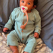 Zaza is registered to the contest to win money with this photo: baby, bed, blanket, bodypart, clothing, couch, cushion, cutlery, face, finger, furniture, hand, head, homedecor, pants, person, photography, portrait, sitting, spoon