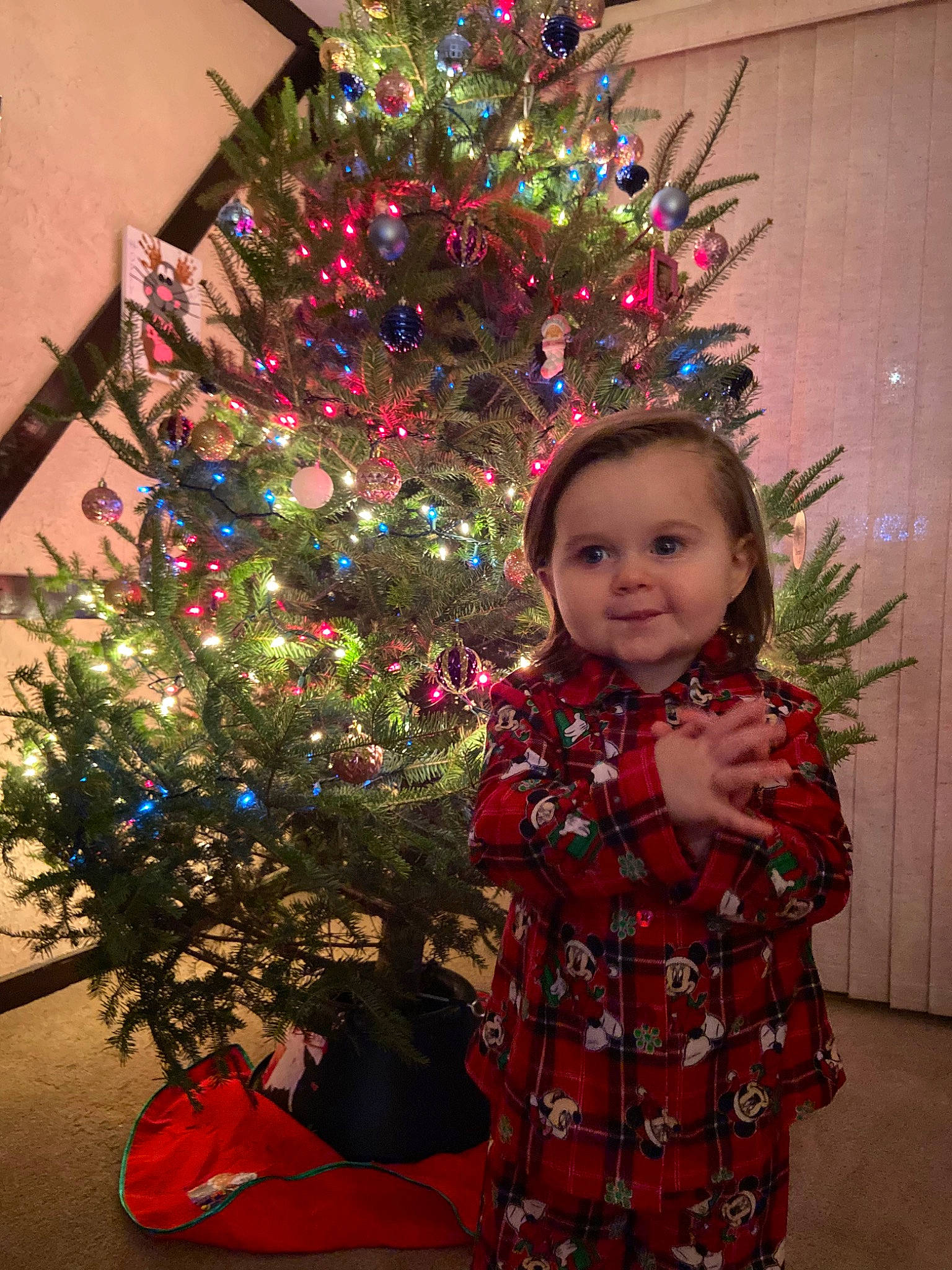 Aurora joined the competition — help win amazing prizes! child, christmas, christmas_decoration, christmas_eve, christmas_ornament, christmas_tree, conifer, event, fir, holiday, holiday_ornament, interior_design, outerwear, person, pine, pine_family, plant, spruce, standing, toddler