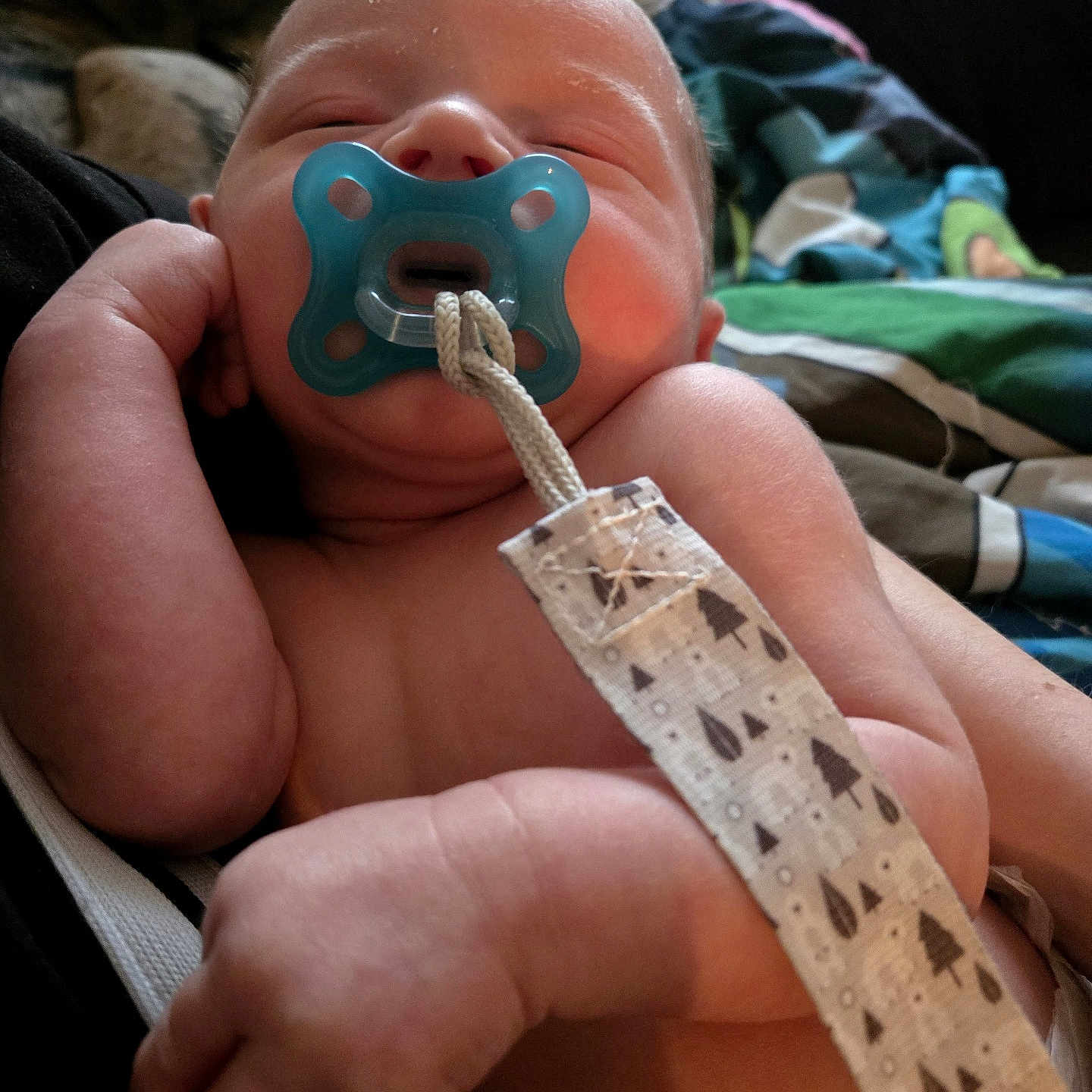 Samuel is registered to the contest to win money with this photo: newborn, baby, pacifier, hand, skin, blanket, pattern, sleeping, closeup, infant, comfort, rest, indoor, person, soft, child, cute, tiny, peaceful, holding