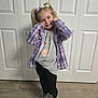 Rilynn-marie is registered to the contest to win money with this photo: child, girl, blonde_hair, pigtails, purple_jacket, grey_tshirt, teddy_bear, black_leggings, shoes, standing, smiling, pose, indoors, wood_floor, white_doors, fashion, cute, happy, portrait, casual_clothing