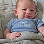 Ryder joined the competition — help win amazing prizes! baby, infant, smile, blue_shirt, little_brother, blanket, cushion, indoor, face, hand, cute, child, person, seated, comfort, young, clothing, portrait, relaxing, home