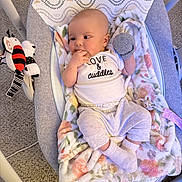 Amara joined the competition — help win amazing prizes! baby, infant, baby_rocker, blanket, mitt, plush_toy, carpet, clothing, cute, comfort, infant_clothing, soft_toys, baby_boy, indoor, person, portrait, relaxing, baby_accessory, baby_bedding, smiling