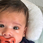 Wave joined the competition — help win amazing prizes! baby, blue_clothing, child, closeup, comfort, cute, expression, eyes, face, hair, head, indoors, infant, pacifier, patterned_clothing, pillow, portrait, resting, skin, young_child