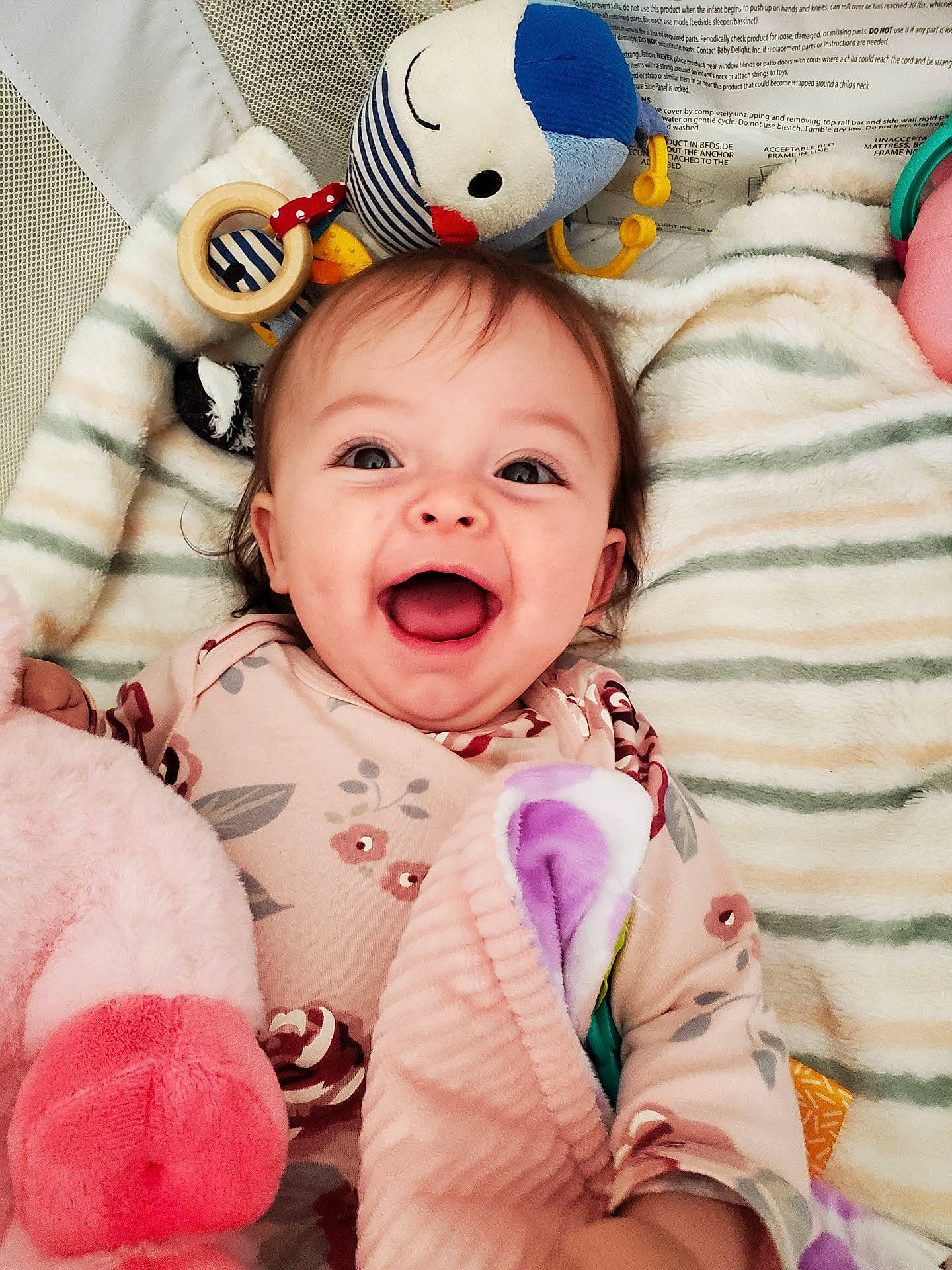 Elouise joined the competition — help win amazing prizes! baby, baby_toddler_clothing, cheek, comfort, eye, facial_expression, gesture, happy, head, iris, linens, nose, person, pink, product, skin, sleeve, smile, textile, toddler