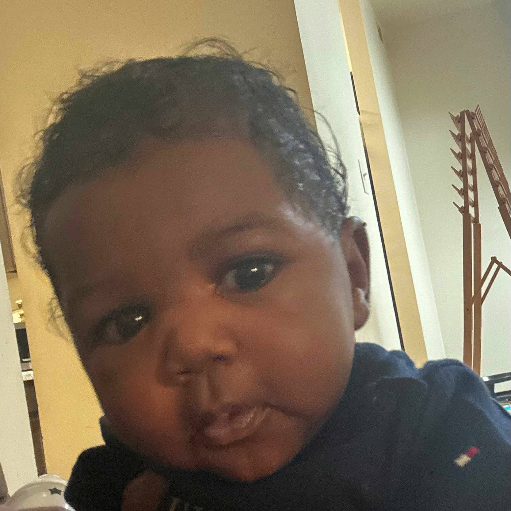 Arhmaun is registered to the contest to win money with this photo: baby, bodypart, clothing, cream, cutlery, dessert, face, food, frown, head, icecream, indoors, mouth, person, photography, portrait, sad, selfie, spoon, teeth