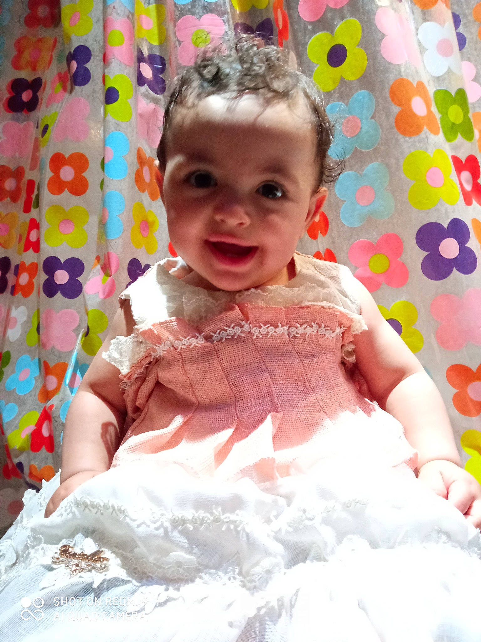 Elina a rejoint le concours — aidez-le/la à gagner de superbes lots ! baby, baby_toddler_clothing, cheek, dress, face, facial_expression, fun, happy, joy, linens, magenta, one_piece_garment, pattern, person, pink, product, purple, skin, sleeve, smile