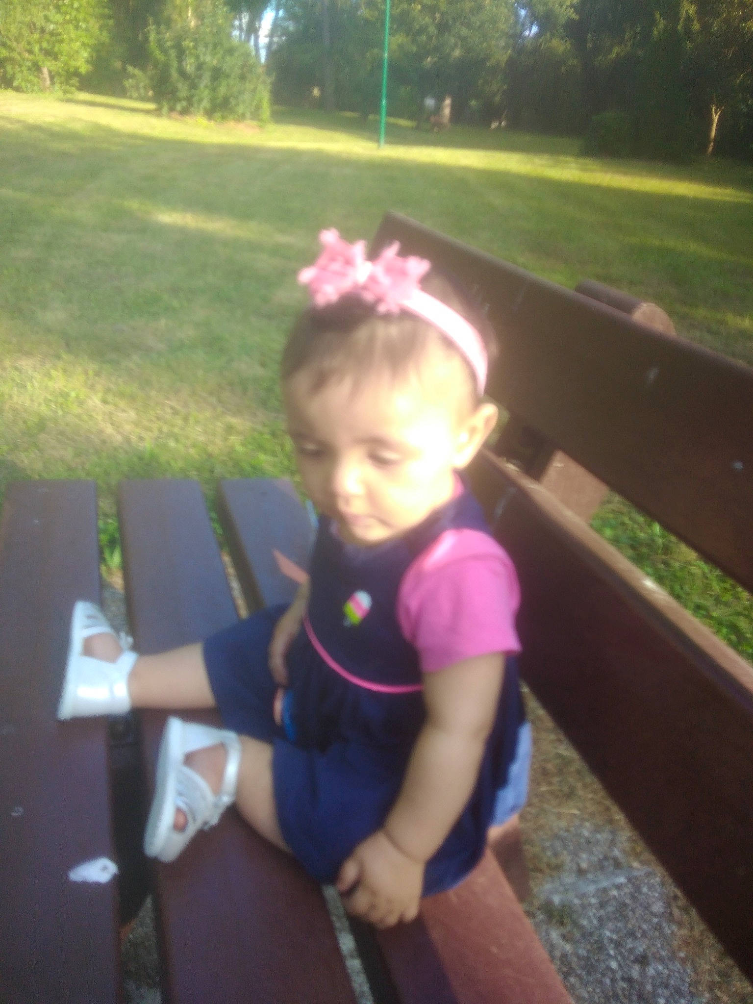 Elina participe au concours pour gagner de l'argent avec cette photo : baby, cool, eyewear, fun, grass, happy, landscape, lawn, leaf, leisure, magenta, morning, person, pink, plant, recreation, sitting, sunlight, thigh, toddler