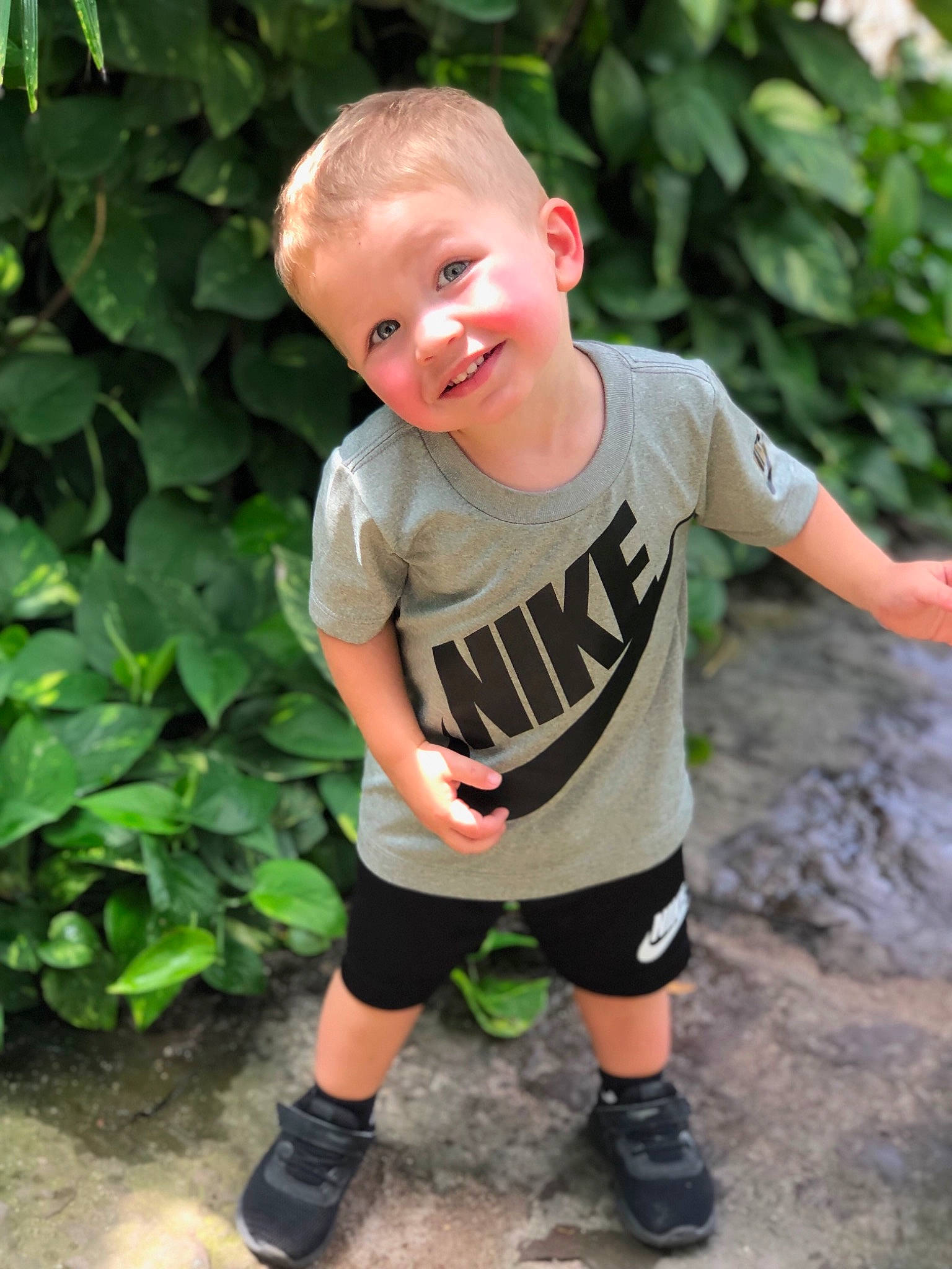 Kaeden is registered to the contest to win money with this photo: baby, baby_toddler_clothing, child, cool, footwear, green, joy, male, person, plant, play, shoe, shorts, sleeve, smile, sportswear, standing, summer, t_shirt, toddler