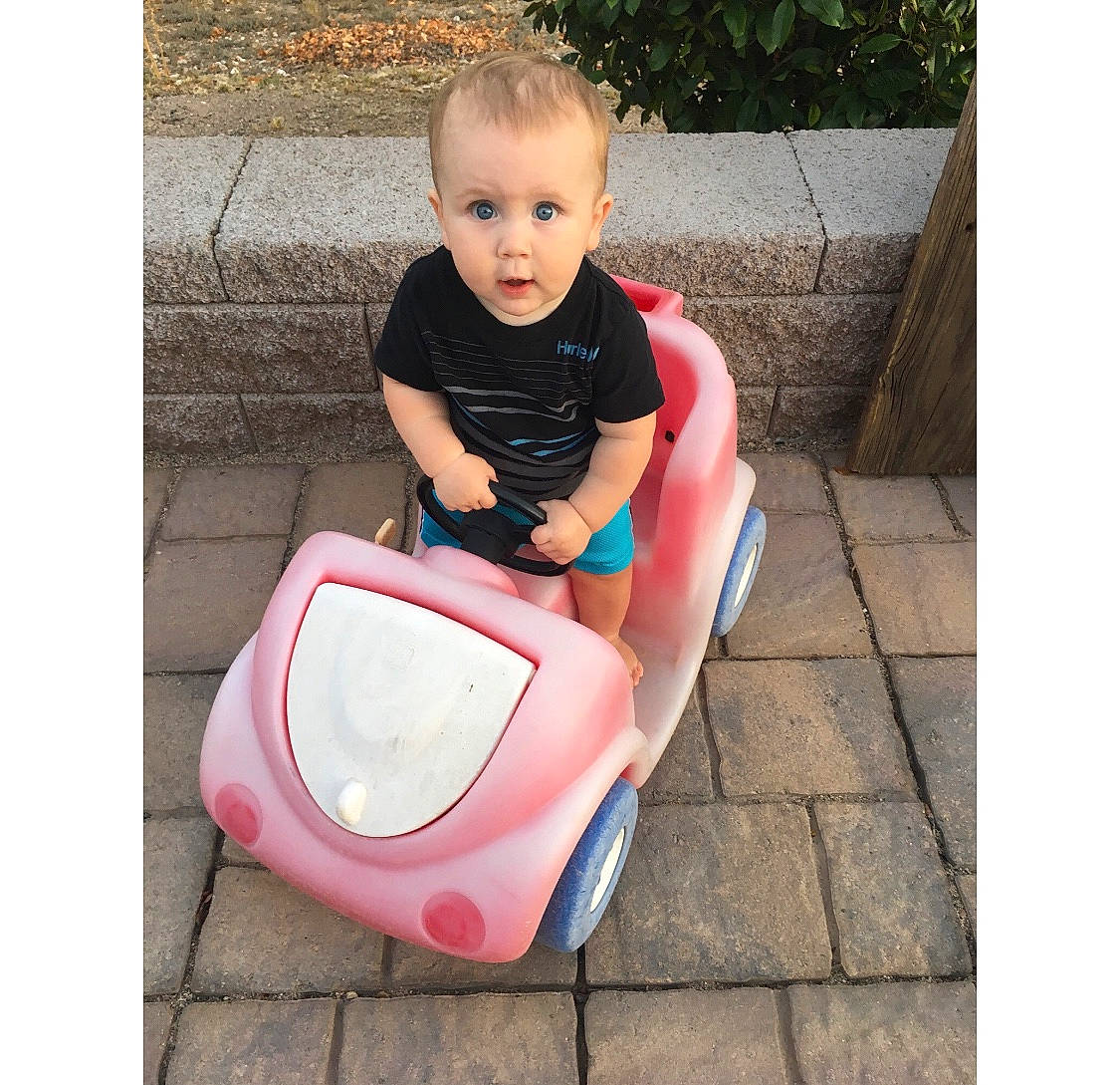 Nixon is registered to the contest to win money with this photo: baby, baby_products, chair, child, comfort, leg, leisure, person, pink, play, potty_training, product, sitting, surprise, toddler, toilet, toilet_seat, vehicle
