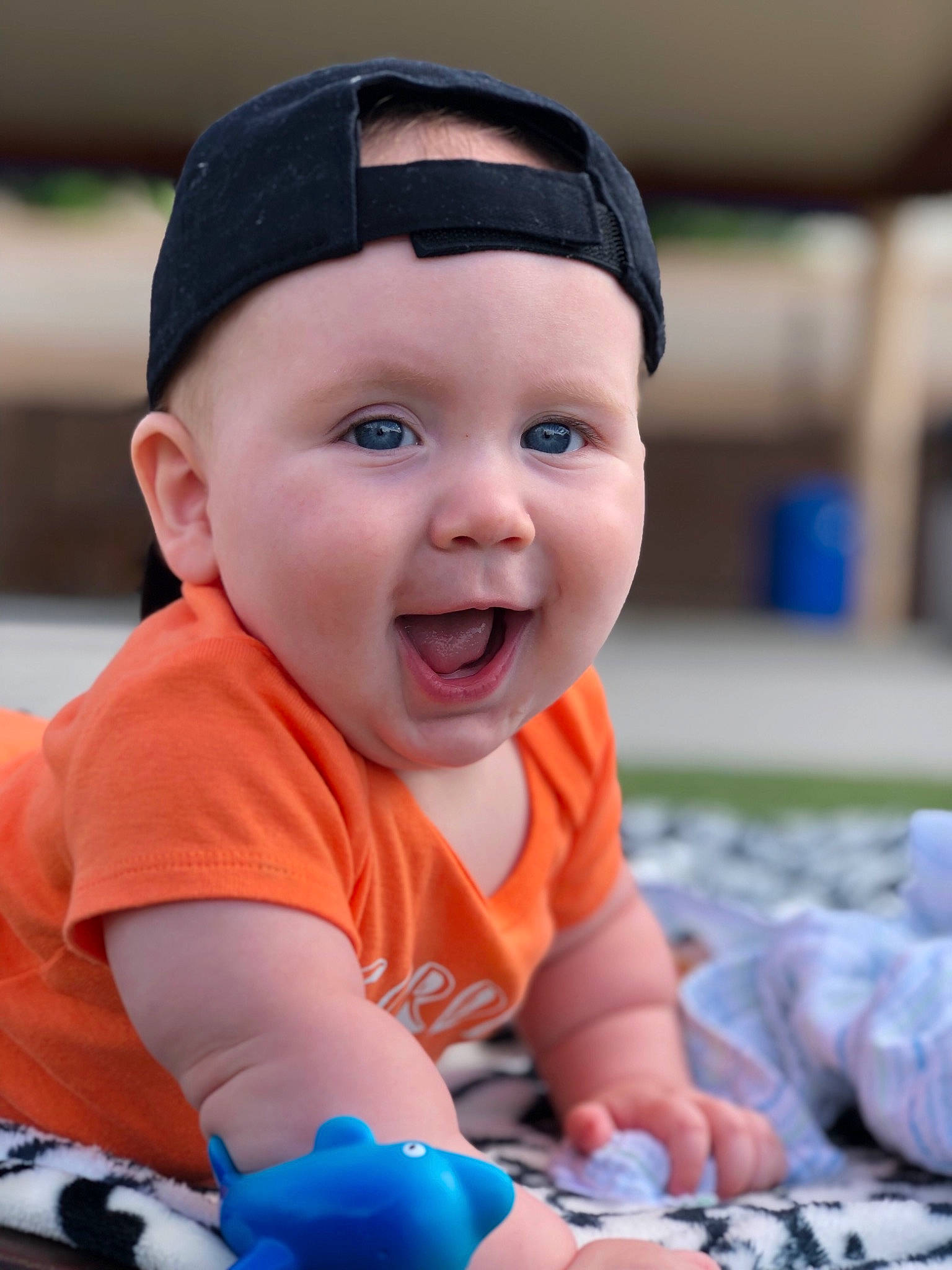 Nixon joined the competition — help win amazing prizes! baby, cheek, child, facial_expression, headgear, headwear, male, person, photography, play, smile, toddler, vacation