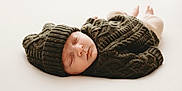 Arthur joined the competition — help win amazing prizes! baby, sleeping, knit_hat, knit_sweater, cozy, infant, soft_surface, peaceful, portrait, child, warm_tones, cute, resting, newborn, closed_eyes, headwear, laying_down, comfort, small, adorable