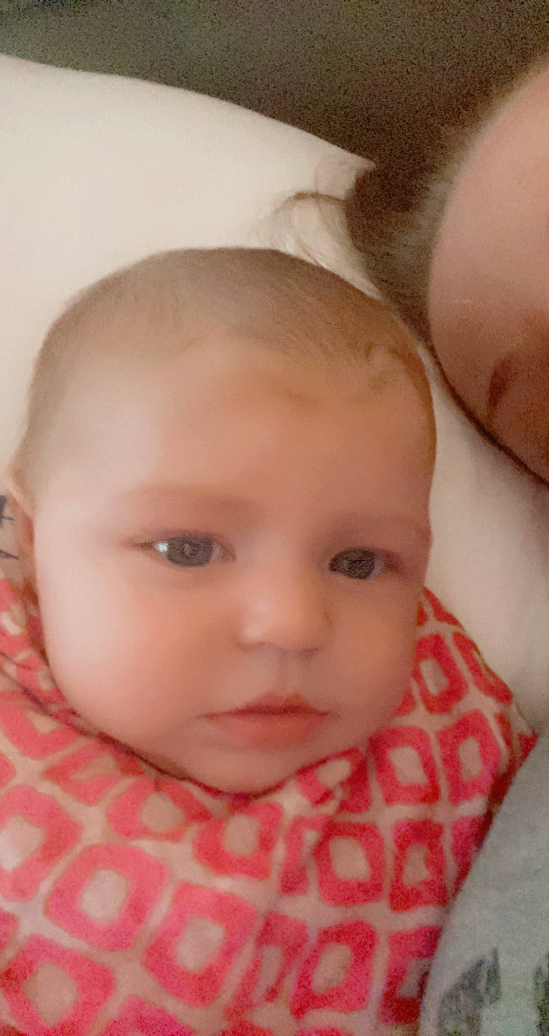 Ava-rose is registered to the contest to win money with this photo: baby, baby_toddler_clothing, cheek, child, chin, comfort, eyebrow, eyelash, face, forehead, iris, linens, lip, mouth, no_expression, nose, pattern, person, skin, toddler