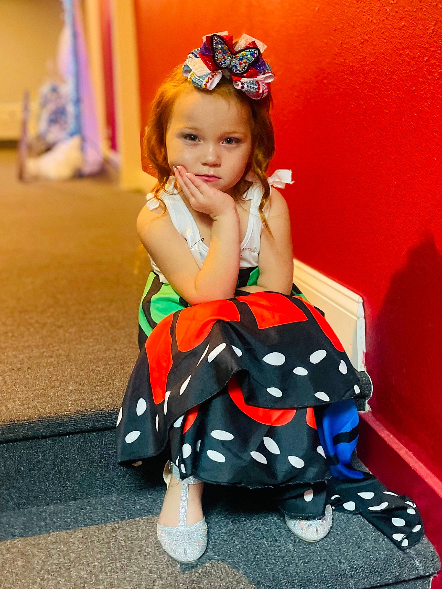 Elizabeth Lowery joined the competition — help win amazing prizes! child, costume, day_dress, dress, event, fashion_accessory, fashion_design, flooring, formal_wear, fun, hairstyle, happy, human_leg, leisure, magenta, pattern, person, sitting, thigh, toddler