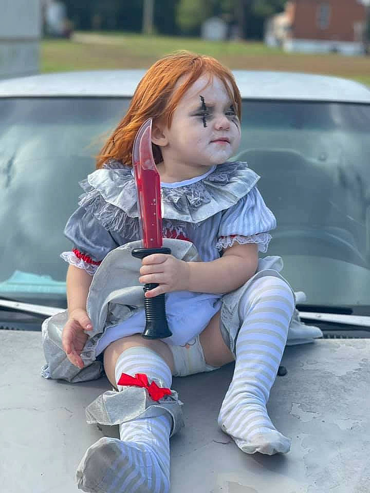 Elizabeth joined the competition — help win amazing prizes! auto_part, automotive_design, automotive_exterior, automotive_lighting, car, denim, electric_blue, grass, human_leg, knee, leg, leisure, motor_vehicle, person, shoe, sneakers, standing, street_fashion, thigh, vehicle