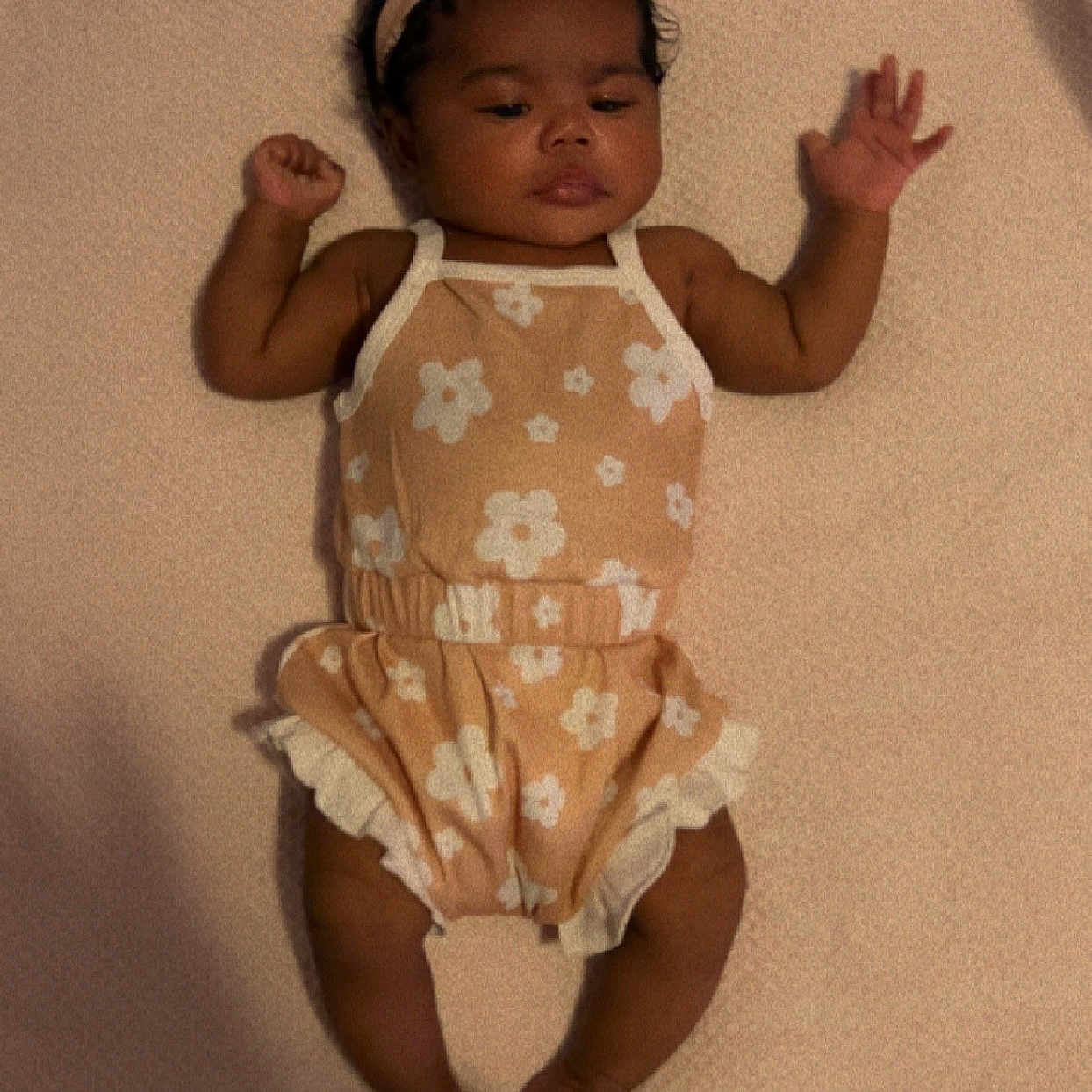 Camila joined the competition — help win amazing prizes! arms_up, baby, blanket, child, clothing, cute, flower_pattern, foot, hand, headband, indoors, infant, lying_down, newborn, peaceful, portrait, romper, skin, sleeping, soft_texture