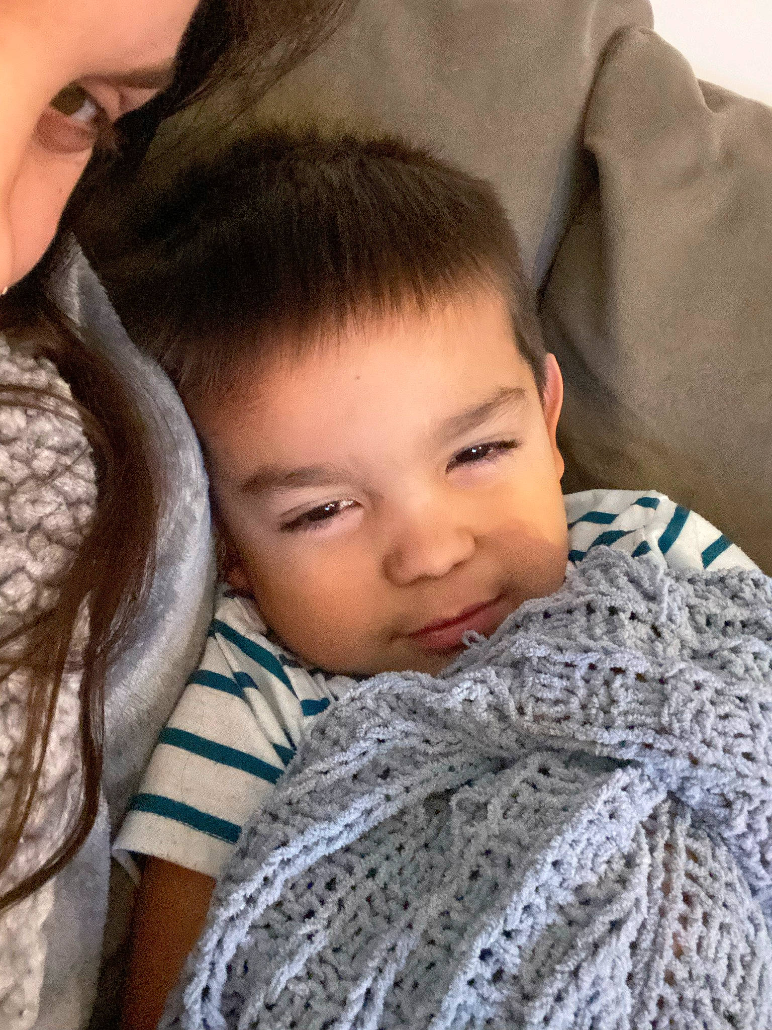 Isaac joined the competition — help win amazing prizes! baby, black_hair, cheek, child, comfort, eyebrow, eyelash, forehead, fur, happy, iris, linens, neck, nose, pattern, person, skin, sleeve, toddler, wool