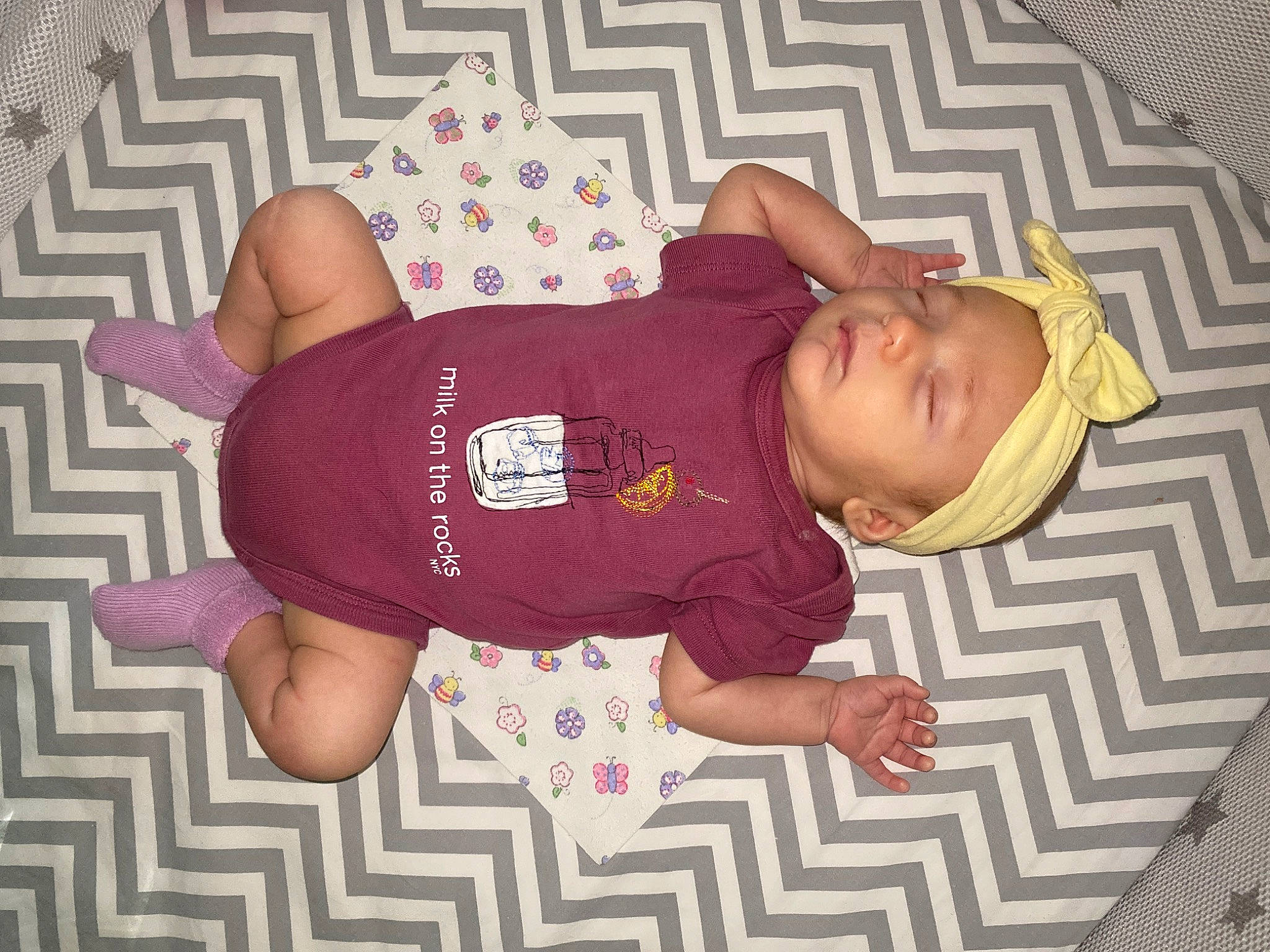 Jupiter joined the competition — help win amazing prizes! baby, baby_toddler_clothing, child, comfort, elbow, flooring, headgear, human_leg, knee, linens, magenta, pattern, person, room, sleeve, sock, t_shirt, thigh, thumb, toddler