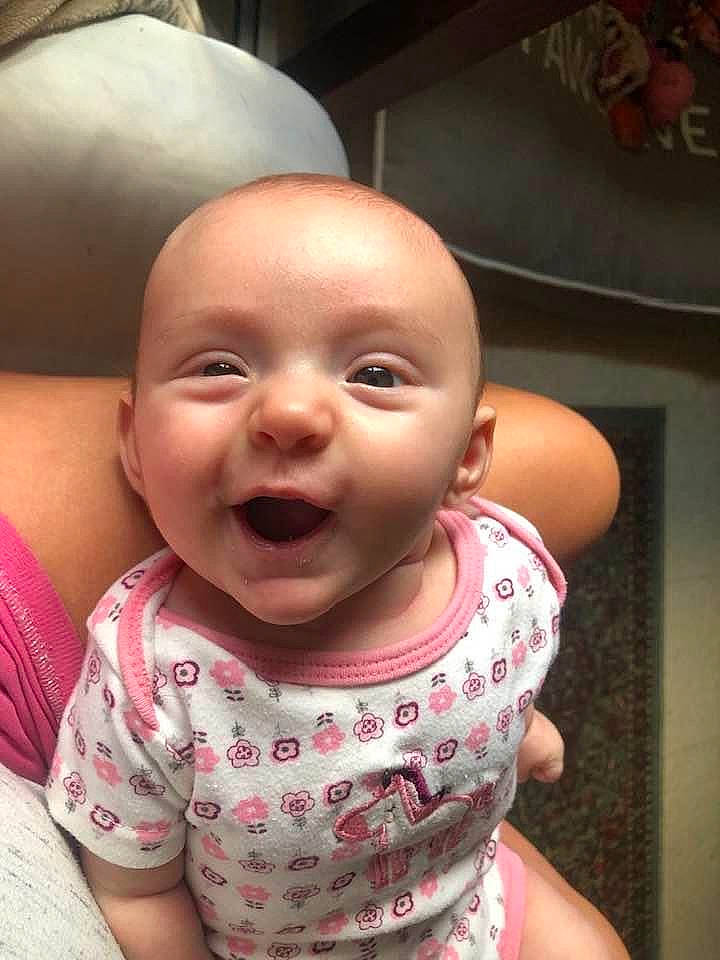 Jupiter is registered to the contest to win money with this photo: baby, baby_toddler_clothing, cheek, chin, eye, eyebrow, gesture, hairstyle, hand, happy, head, iris, lip, mouth, neck, nose, person, skin, sleeve, smile