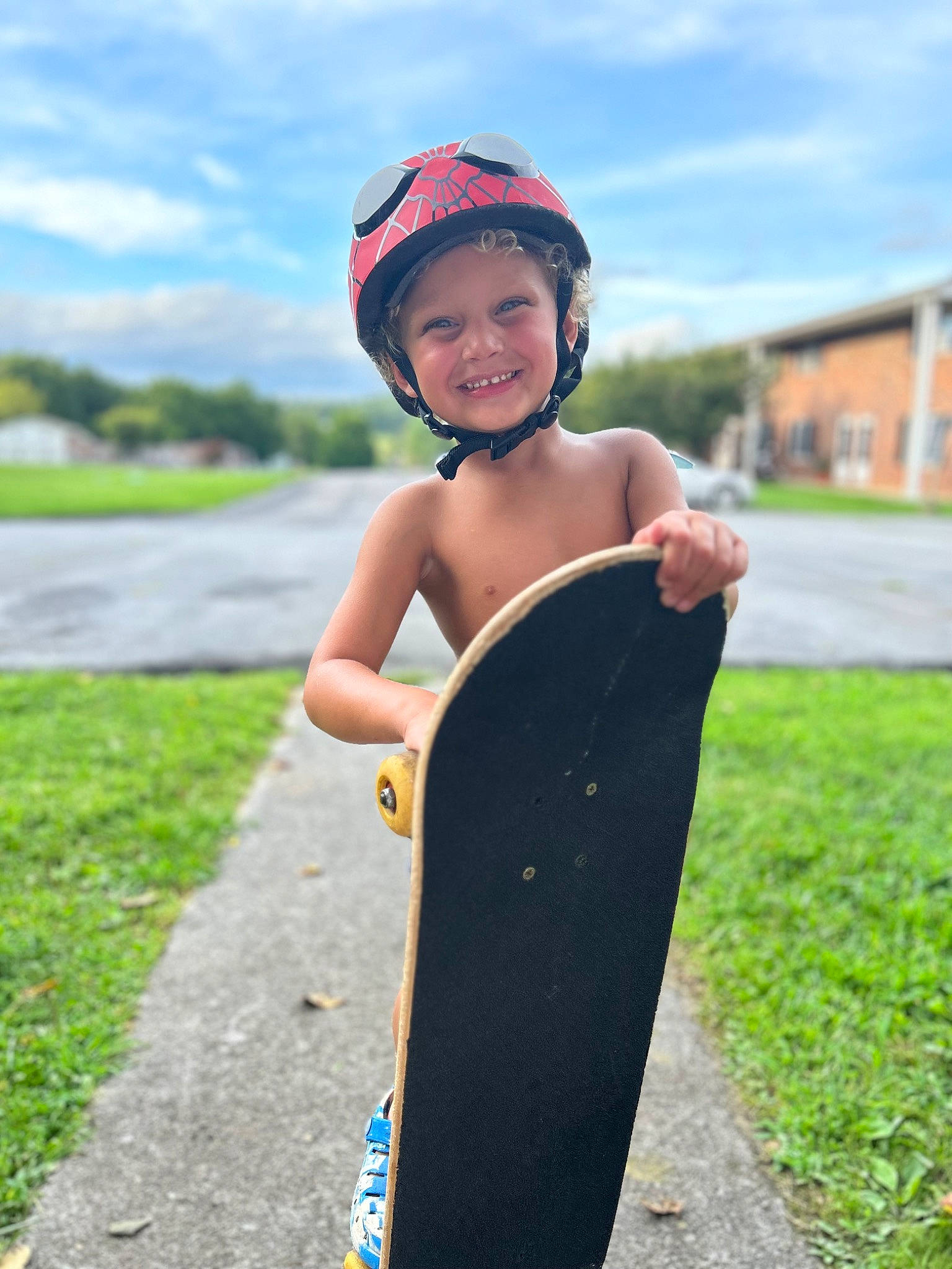 Braven is registered to the contest to win money with this photo: asphalt, bicycle_helmet, bicycles_equipment_and_supplies, cloud, face, flash_photography, grass, happy, headwear, helmet, joy, leisure, person, personal_protective_equipment, plant, recreation, rolling, sky, smile, sports_equipment