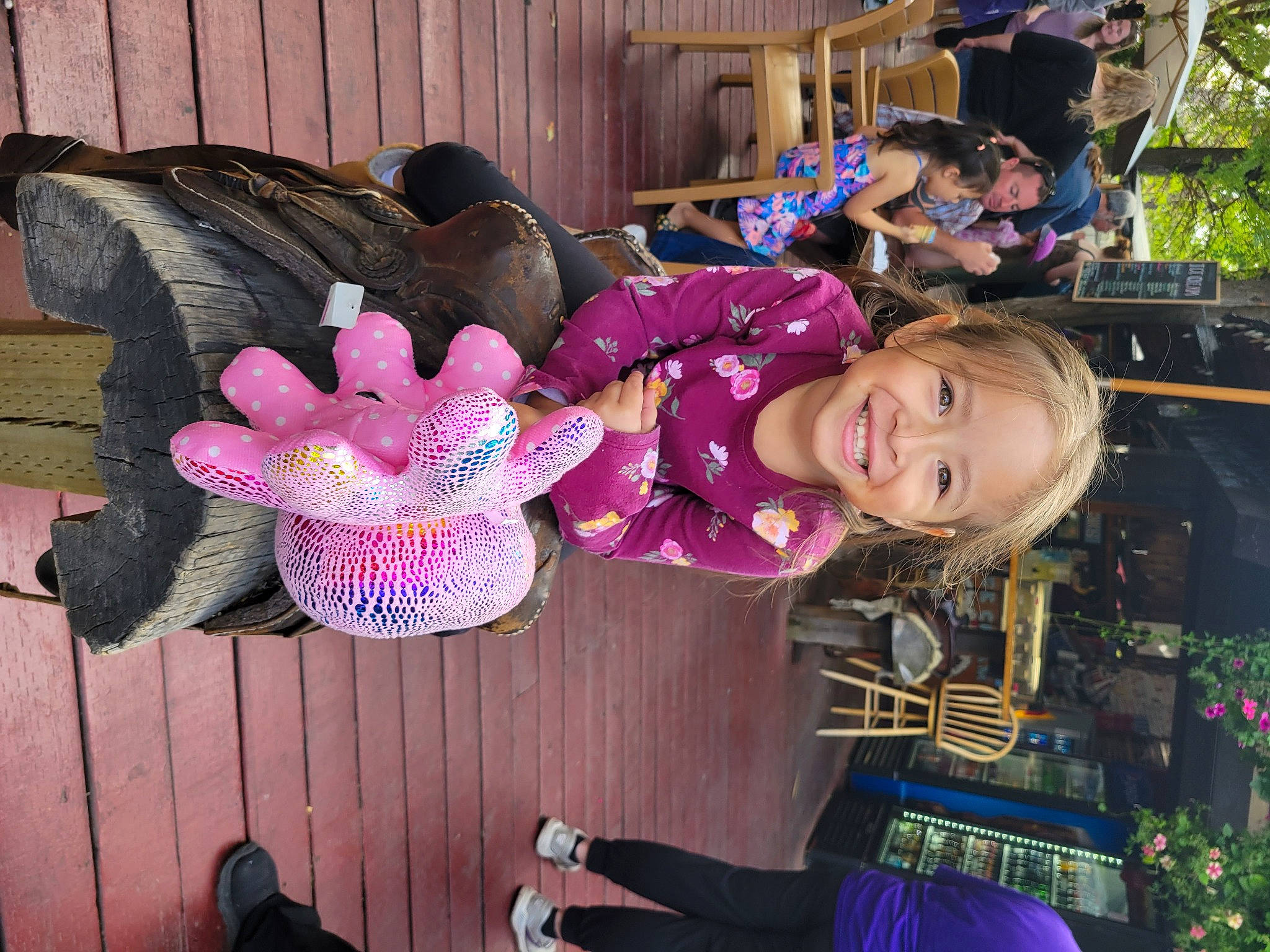 Juniper is registered to the contest to win money with this photo: blurred, child, costume, event, fun, fur, happy, holiday, joy, leisure, magenta, person, pink, purple, recreation, smile, toddler, tree, violet