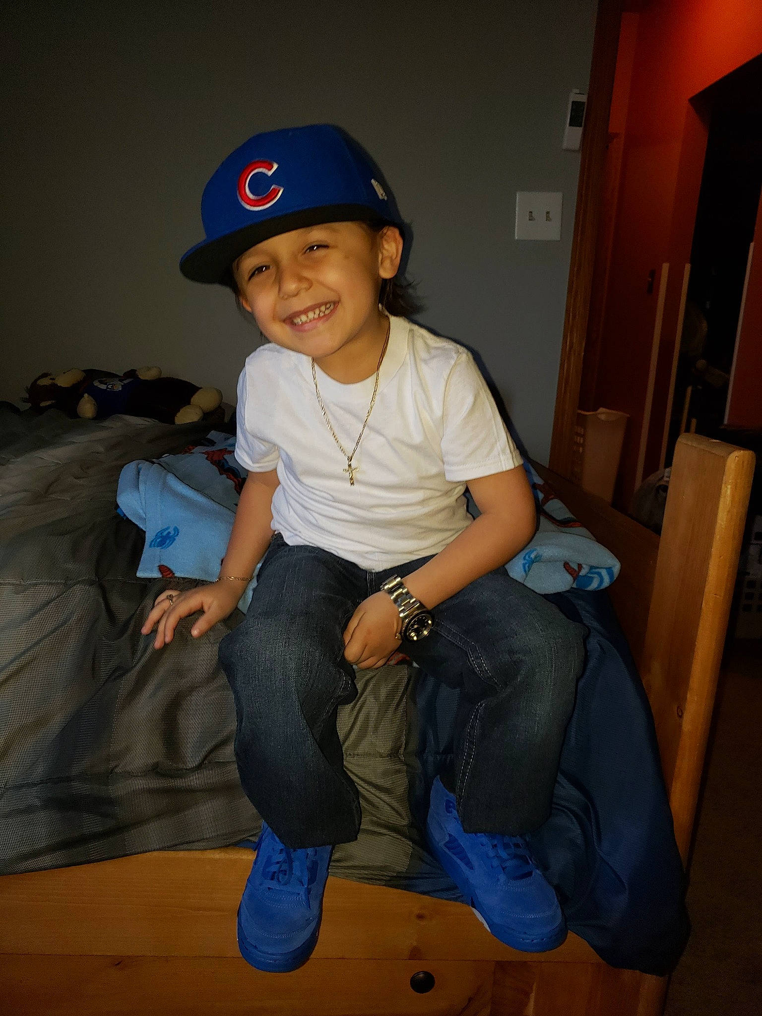 Gustavo joined the competition — help win amazing prizes! baseball_cap, blue, cap, child, cool, fashion_accessory, fun, hat, headgear, headwear, joy, person, shoe, sitting, sun_hat, t_shirt