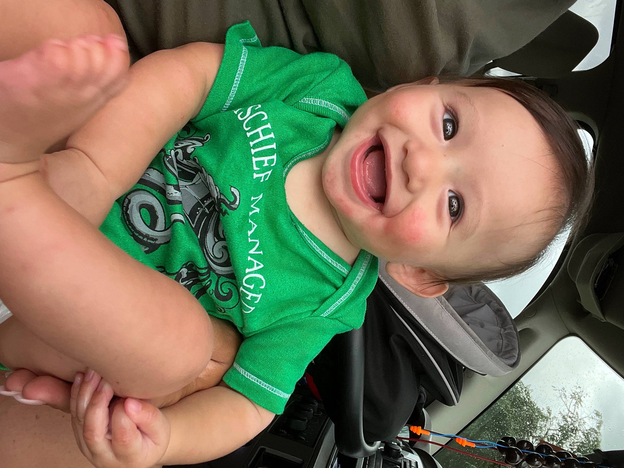 Slater is registered to the contest to win money with this photo: baby, baby_toddler_clothing, cheek, child, cool, finger, flash_photography, grass, hand, happy, iris, leaf, mouth, nose, person, skin, sleeve, smile, thumb, toddler