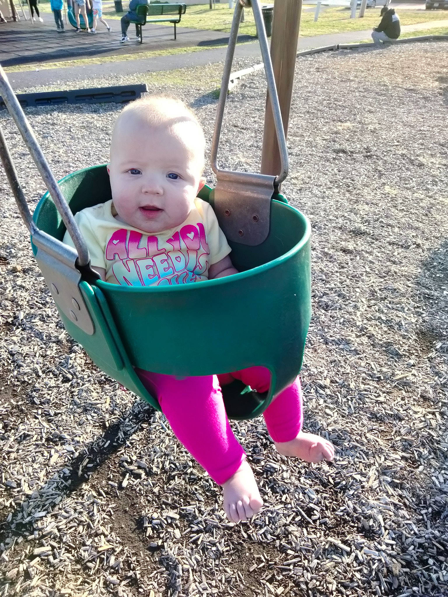 Orchid joined the competition — help win amazing prizes! baby, baby_products, baby_toddler_clothing, child, city, comfort, fun, grass, leisure, magenta, outdoor_play_equipment, person, photograph, pink, play, playground, recreation, sitting, swing, tire