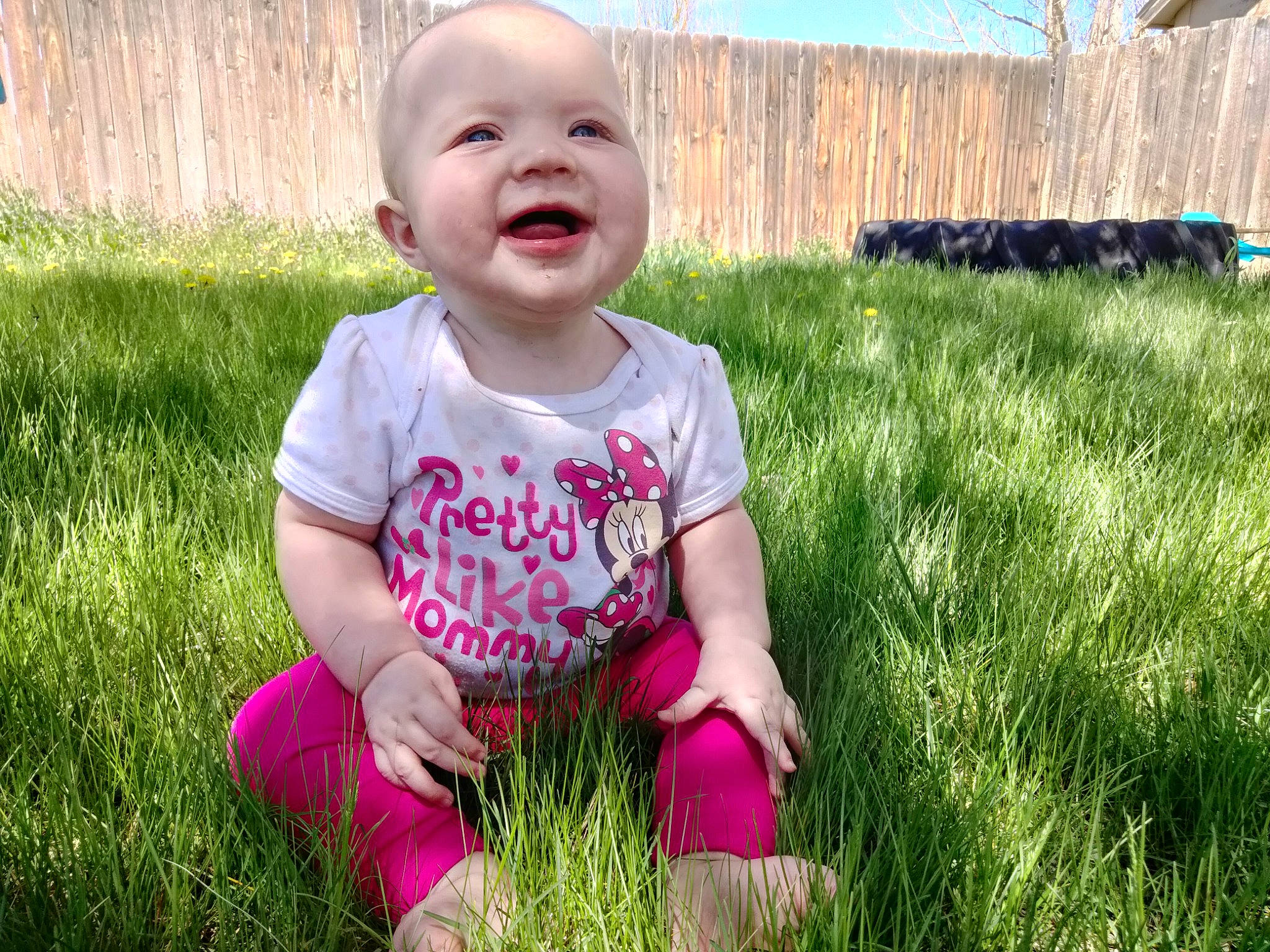 Orchid joined the competition — help win amazing prizes! baby_toddler_clothing, child, dress, face, fun, grass, grassland, happy, meadow, morning, people_in_nature, person, photograph, pink, plant, skin, smile, standing, sunlight, t_shirt