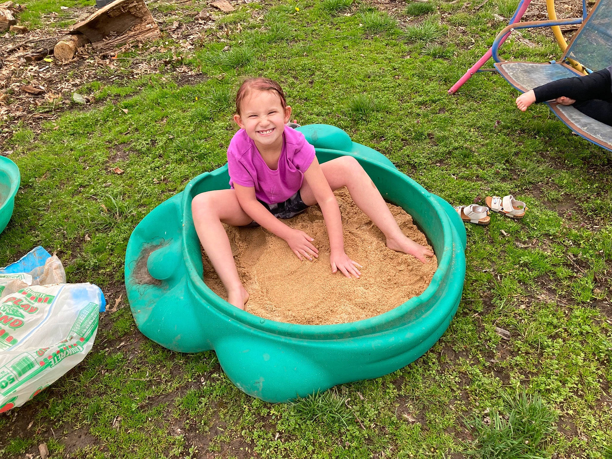 Skylynn joined the competition — help win amazing prizes! chair, child, fun, garden, gardening, grass, green, joy, leisure, outdoor_play_equipment, people_in_nature, person, plant, recreation, shorts, smile, soil, t_shirt, tire, toddler
