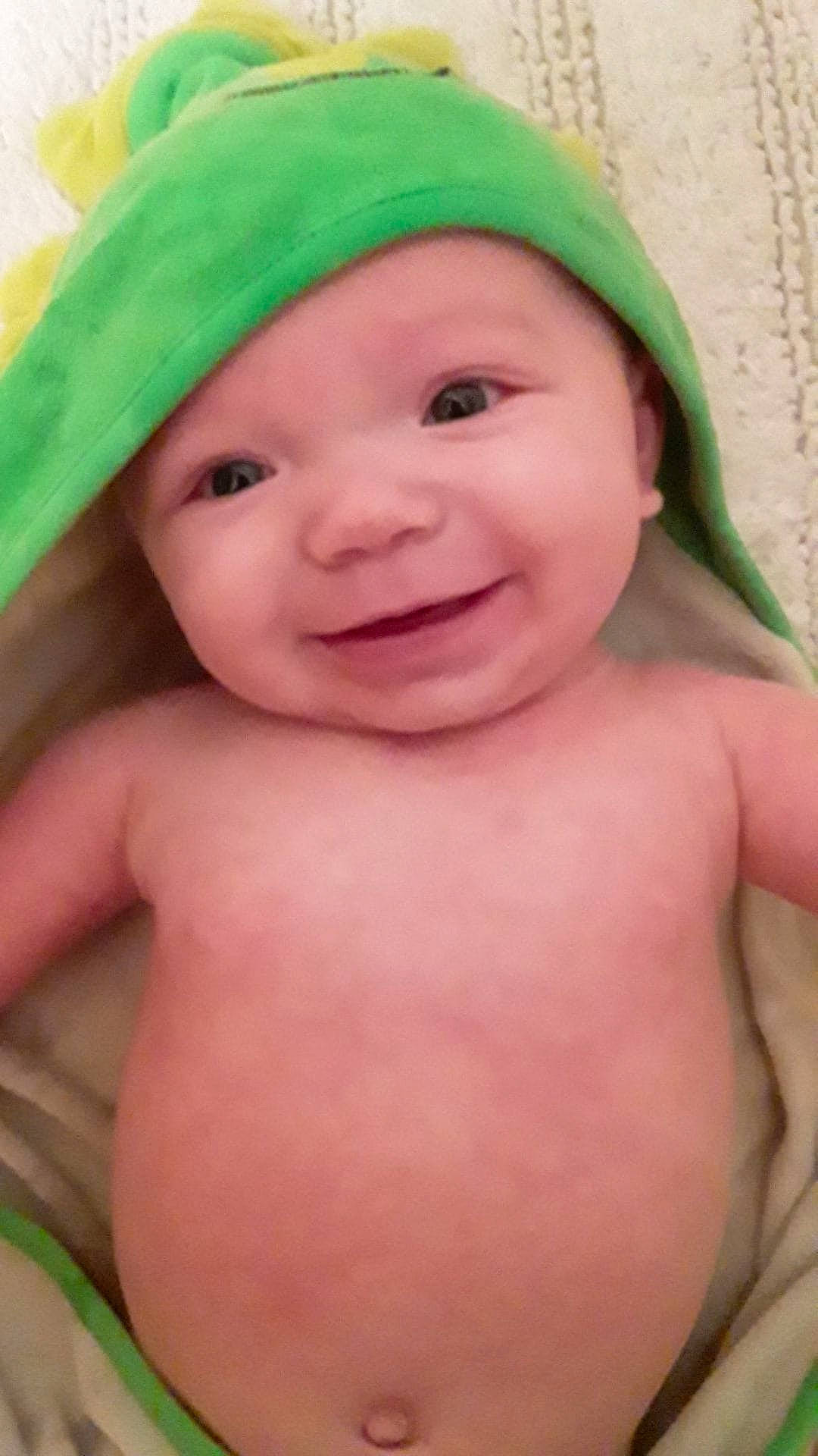 Harlem joined the competition — help win amazing prizes! baby, cheek, child, chin, face, green, head, headgear, headwear, joy, lip, mouth, nose, person, skin, smile, toddler