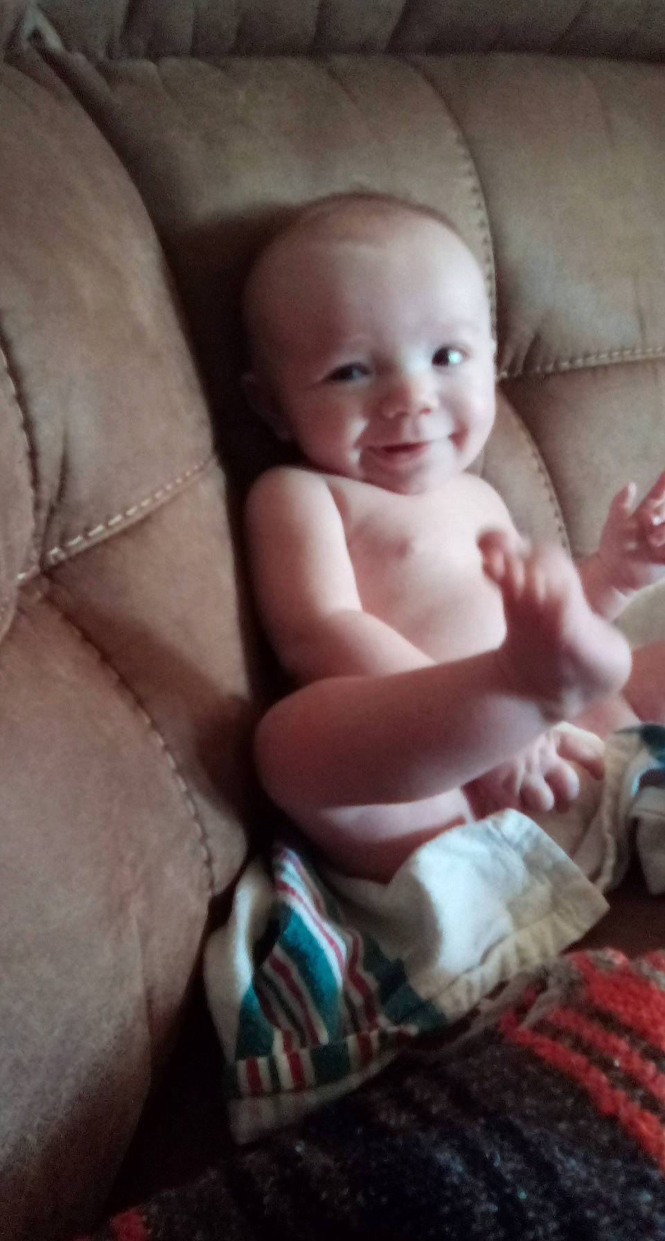 Harlem is registered to the contest to win money with this photo: baby, cheek, child, eye, finger, hand, joy, leg, person, skin, thumb, toddler