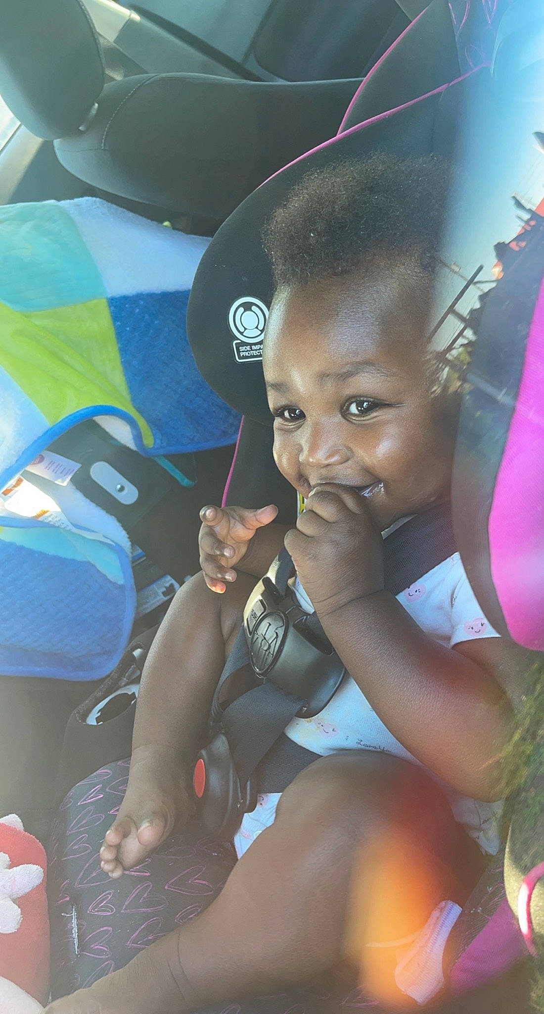 Ta'Miya joined the competition — help win amazing prizes! automotive_design, automotive_tire, black, black_hair, car_seat, child, cool, family_car, fun, happy, leisure, motor_vehicle, person, photograph, sitting, skin, smile, snapshot, thigh, toddler