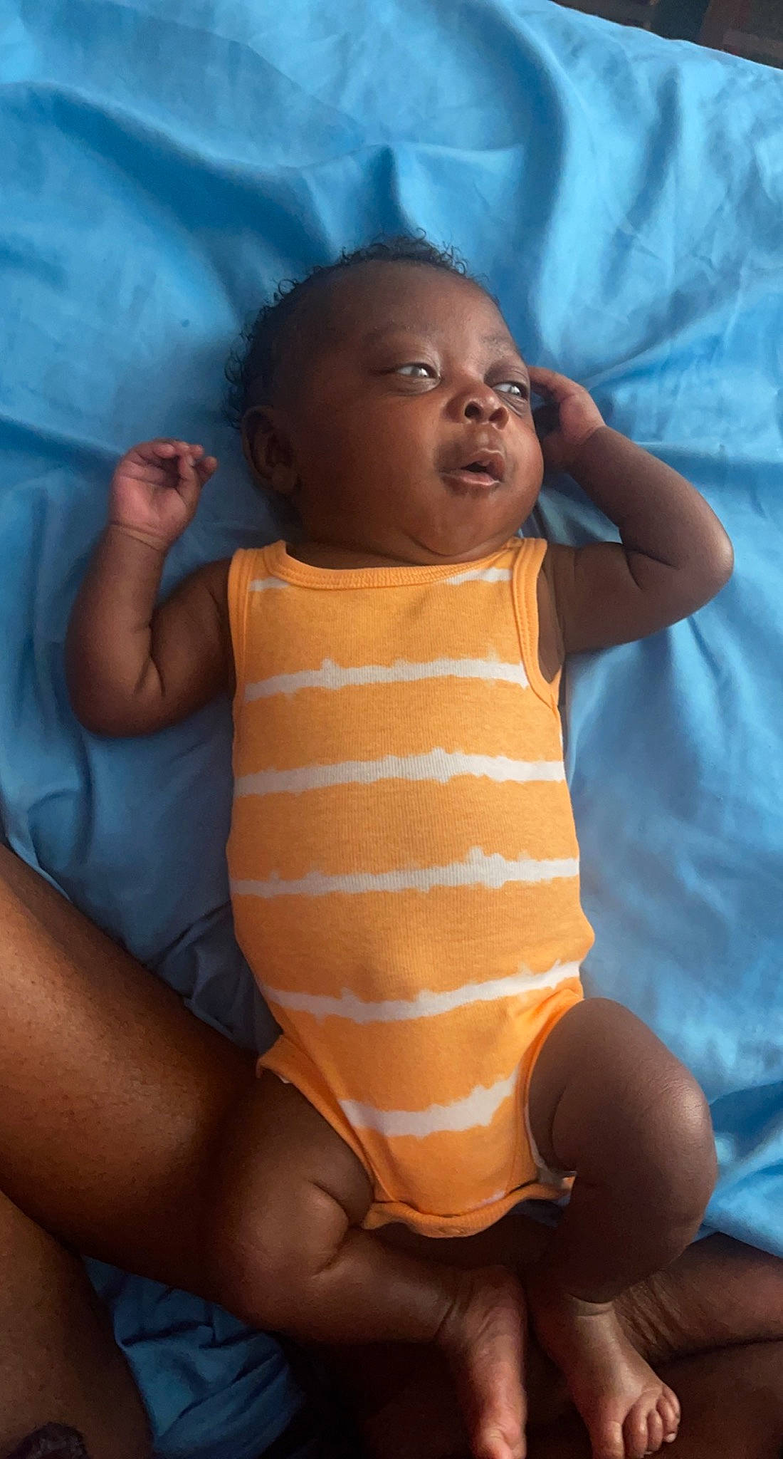 Joshua joined the competition — help win amazing prizes! arm, baby, baby_toddler_clothing, comfort, eye, eyebrow, face, finger, gesture, happy, human_body, joint, lip, mouth, neck, nose, orange, person, skin, stomach