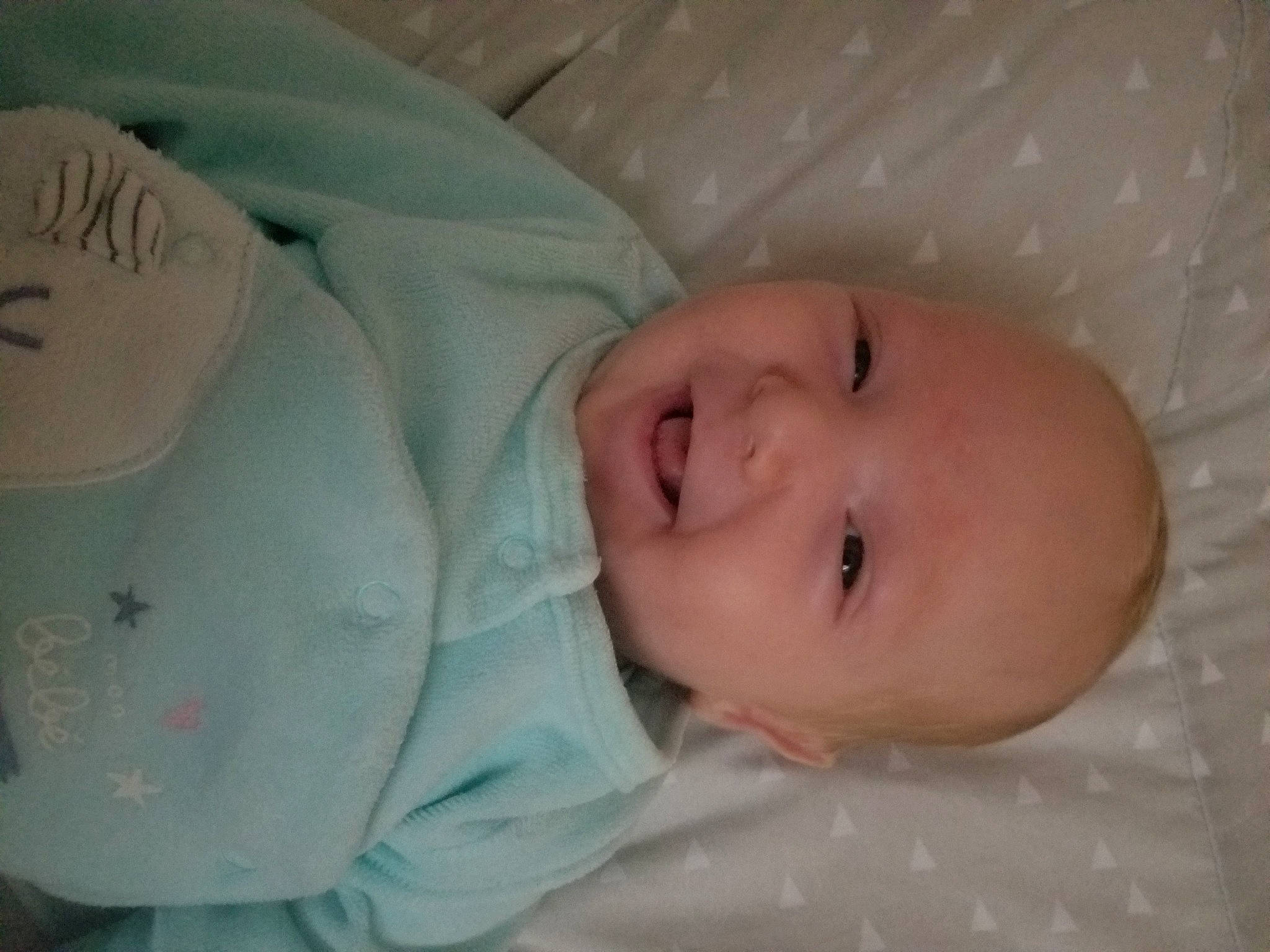 Gabriel participe au concours pour gagner de l'argent avec cette photo : baby, baby_products, baby_toddler_clothing, bedtime, cheek, child, comfort, eye, iris, linens, nap, nose, person, room, skin, sleep, smile, toddler