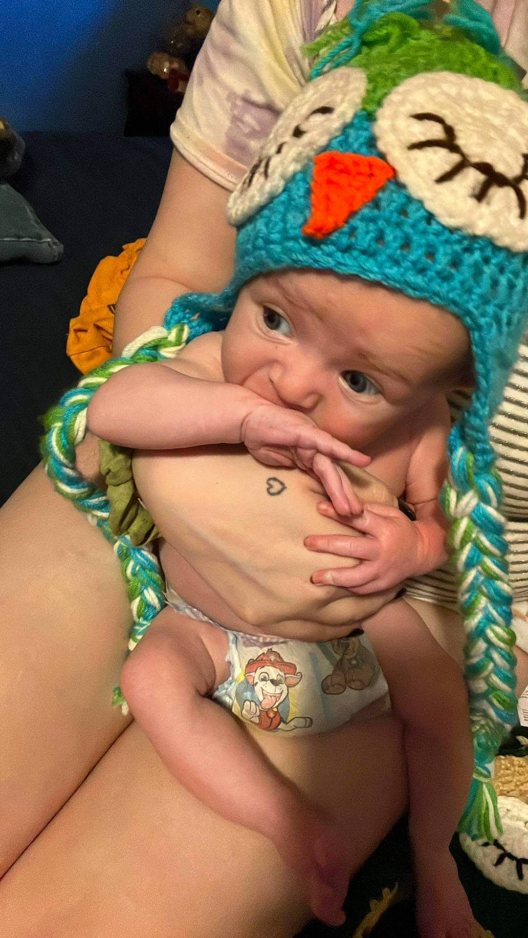 Paxton is registered to the contest to win money with this photo: abdomen, baby, cap, cheek, chest, child, eye, finger, grass, green, happy, headwear, jewellery, knit_cap, nail, person, skin, thigh, thumb, toddler