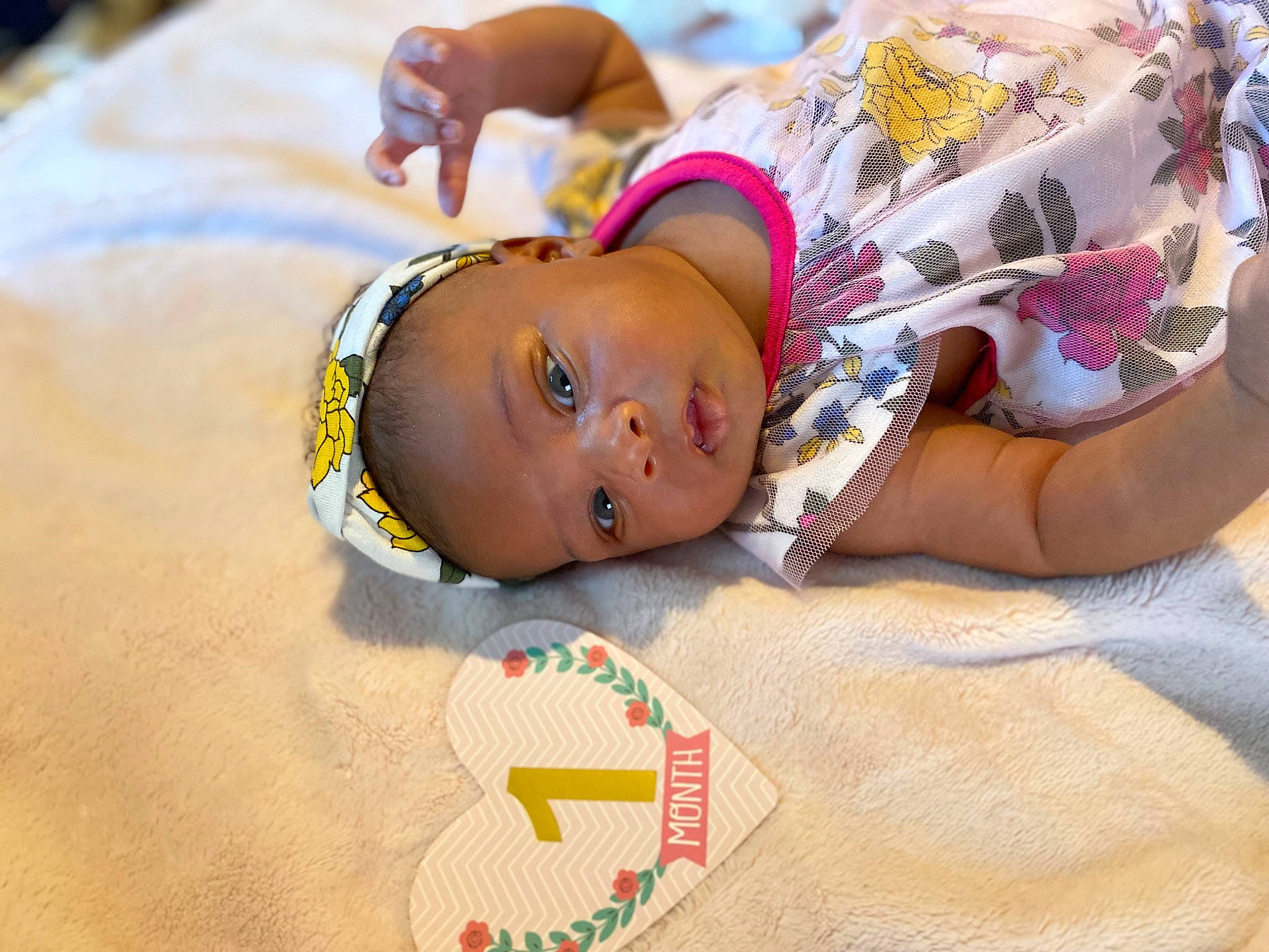 Ahlani joined the competition — help win amazing prizes! abdomen, baby, baby_toddler_clothing, chest, child, fashion_accessory, fawn, flooring, fun, hair_accessory, happy, headband, jewellery, leisure, linens, person, personal_protective_equipment, sand, skin, toddler