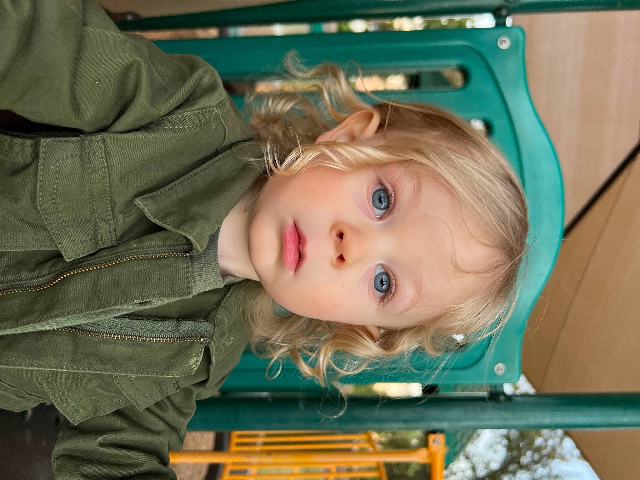 Zakai is registered to the contest to win money with this photo: blond, cheek, child, chin, electric_blue, eye, eyebrow, fun, hairstyle, iris, leisure, mouth, nose, person, room, sitting, skin, sleeve, toddler, tree