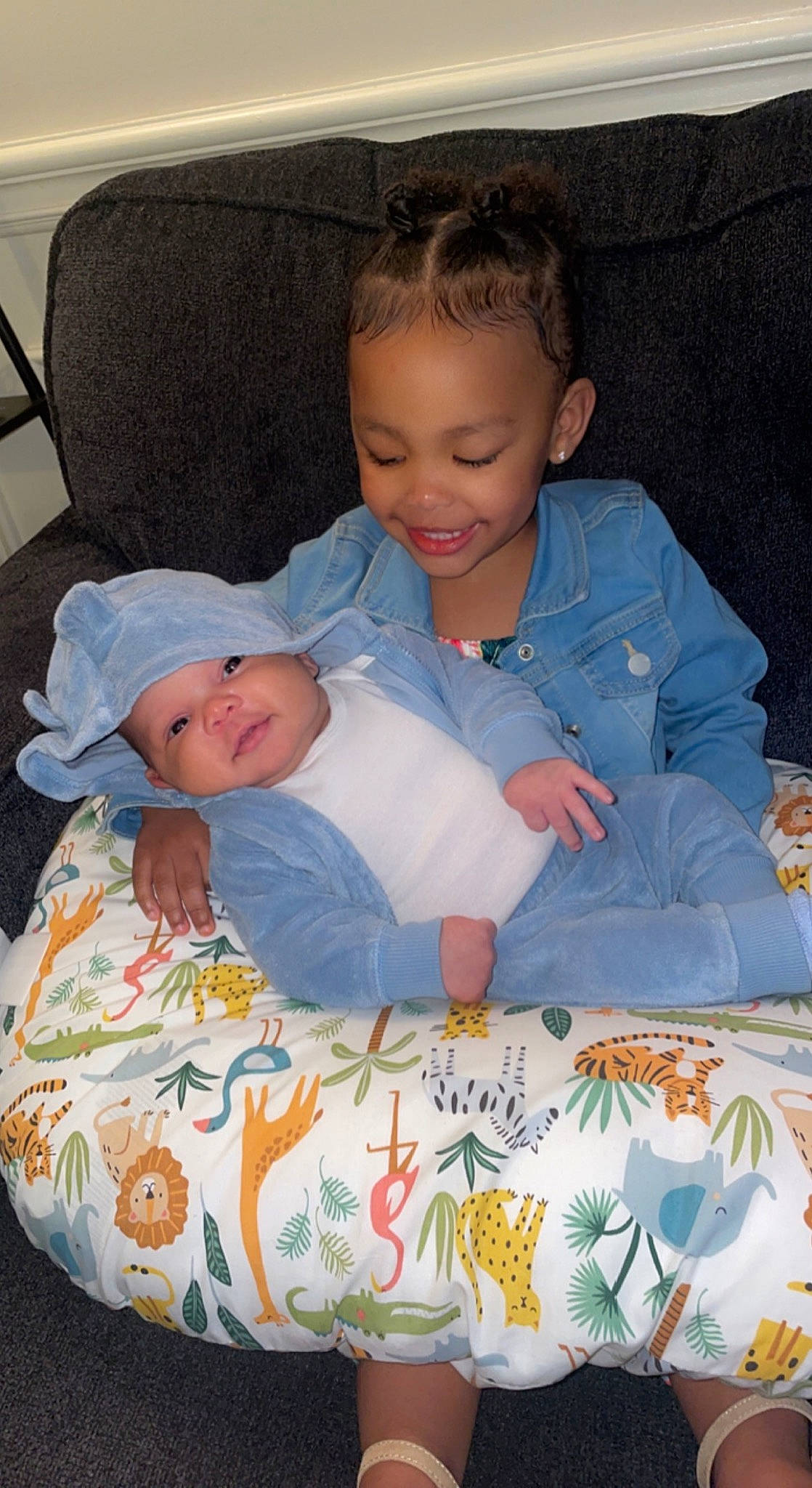 Nyasia joined the competition — help win amazing prizes! baby, baby_products, baby_toddler_clothing, cheek, child, comfort, eye, face, facial_expression, head, headwear, joy, lap, linens, mammal, organ, person, sitting, skin, smile