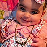 Ellyana is registered to the contest to win money with this photo: baby, smiling, headband, floral, pink, gold_necklace, bracelet, cute, infant, portrait, happy, child, clothing, pattern, blanket, indoors, closeup, face, skin, hand