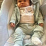 Adonis joined the competition — help win amazing prizes! baby, infant, child, hoodie, sweatpants, socks, cushion, patterned, indoor, portrait, clothing, person, cute, young, relaxed, seated, soft, comfortable, expression, casual