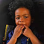 Amiri is registered to the contest to win money with this photo: afro_hair, baby, blue_shirt, car_interior, car_seat, child, closeup, curious_expression, cute, fingers_in_mouth, hair, hands, indoors, portrait, safety, seat, seatbelt, skin, toddler, young_child