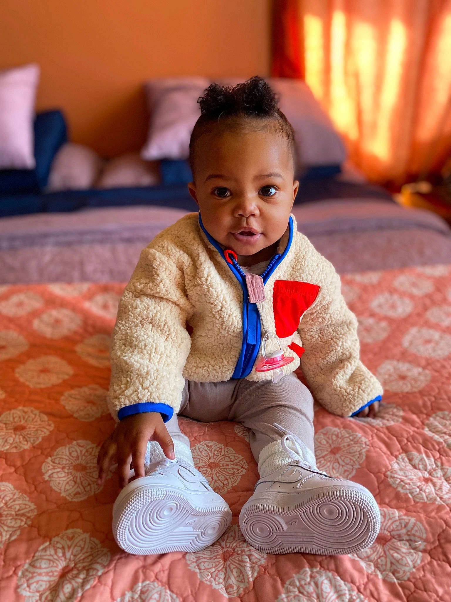 Lennox joined the competition — help win amazing prizes! baby, baby_toddler_clothing, comfort, crawling, eye, facial_expression, finger, floor, flooring, grass, happy, head, leg, orange, person, skin, sleeve, smile, toddler, tummy_time